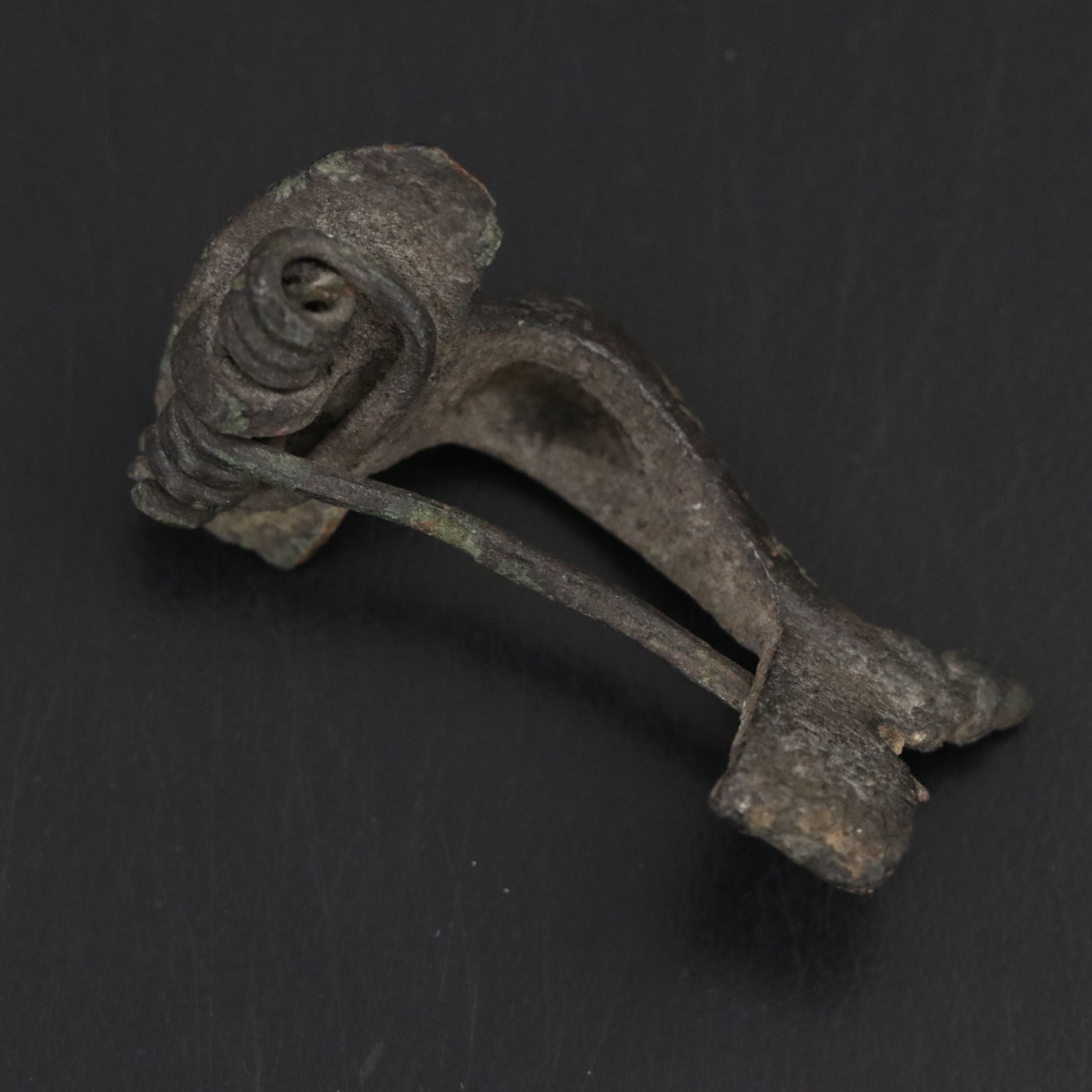 Roman Bronze Fibula, Byzantine Token and Egyptian Faience Amulet