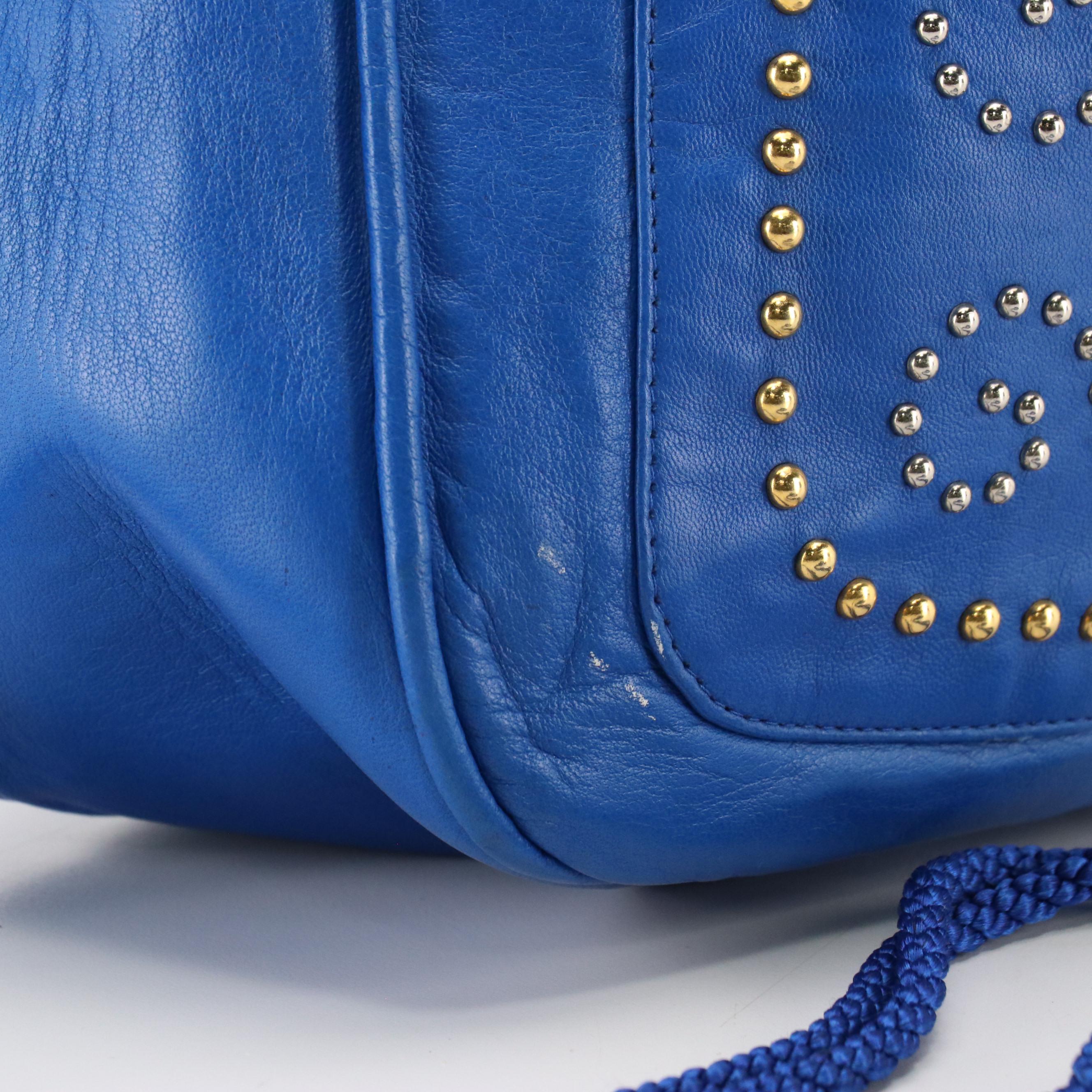 Yves Saint Laurent Studded Drawstring Bucket Crossbody Bag in Blue Leather