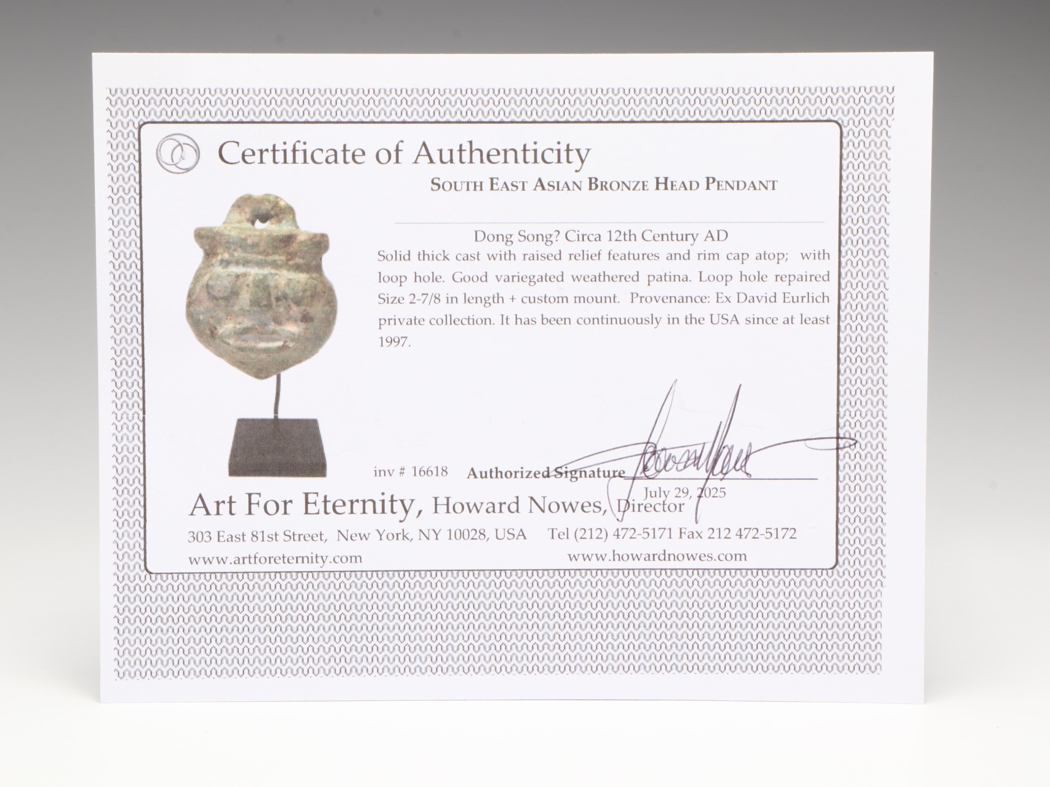 Southeast Asian Bronze Head Pendant, Circa 12th Century CE