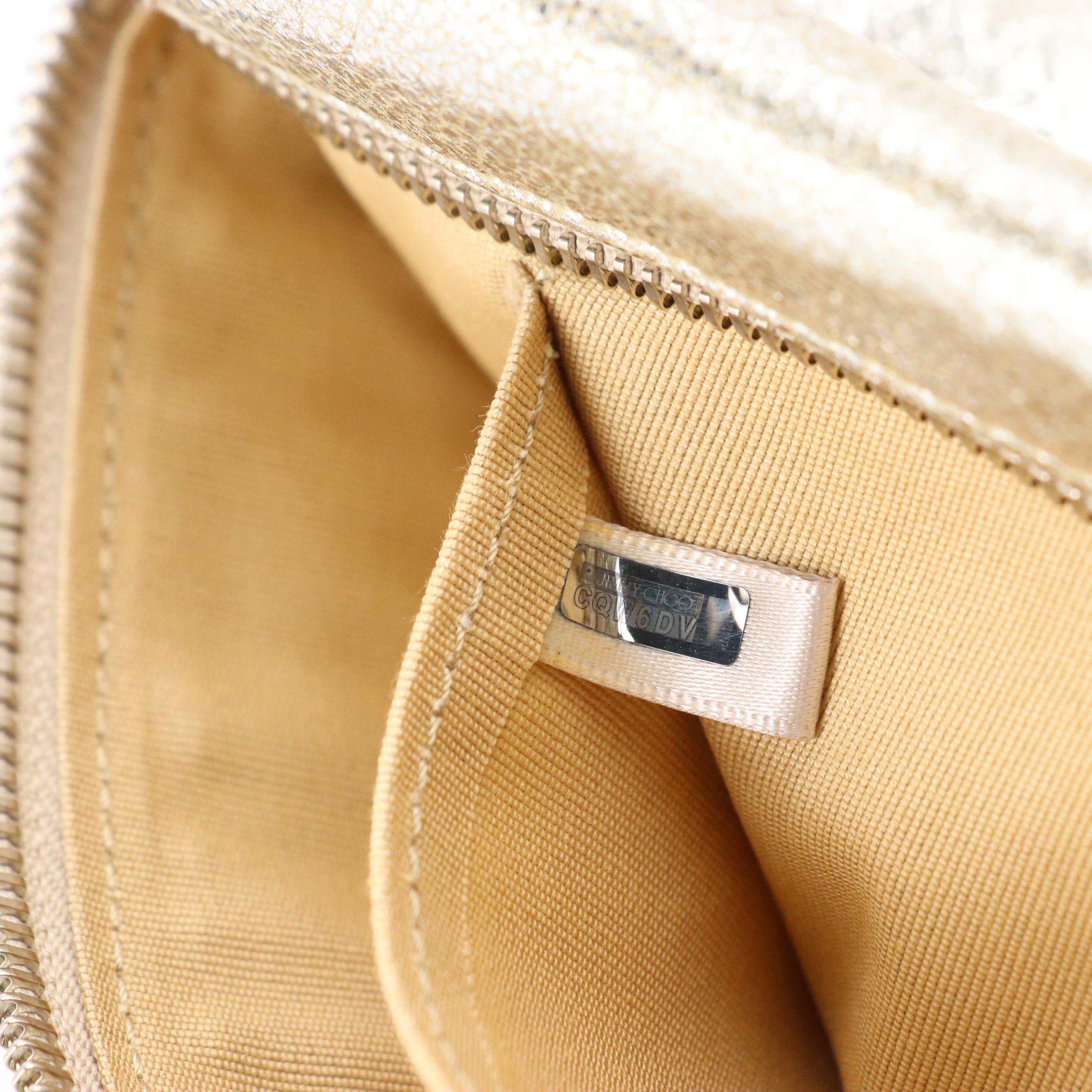 Jimmy Choo Zena Clutch in Silver Tone Star Studded Metallic Silver Leather