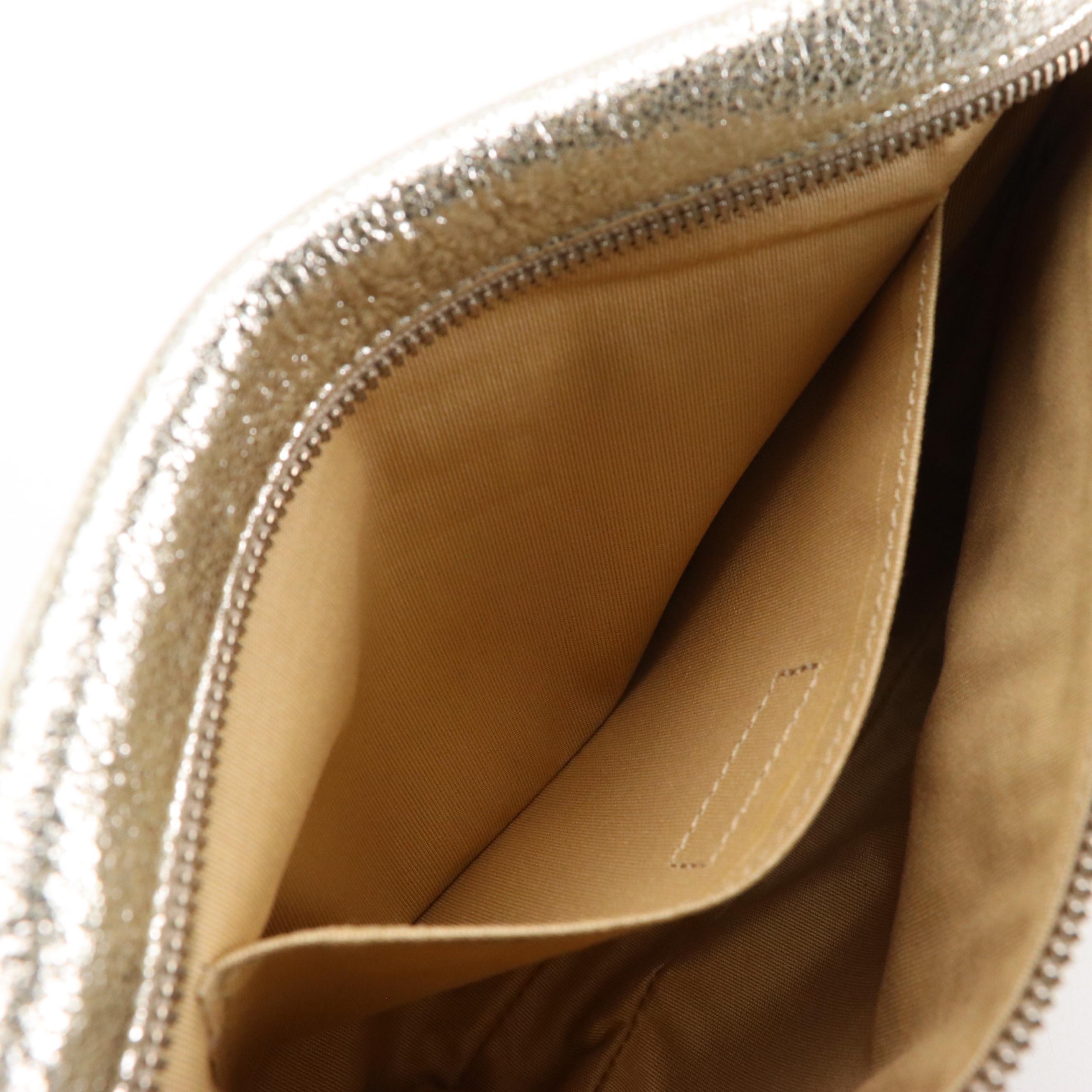 Jimmy Choo Zena Clutch in Silver Tone Star Studded Metallic Silver Leather