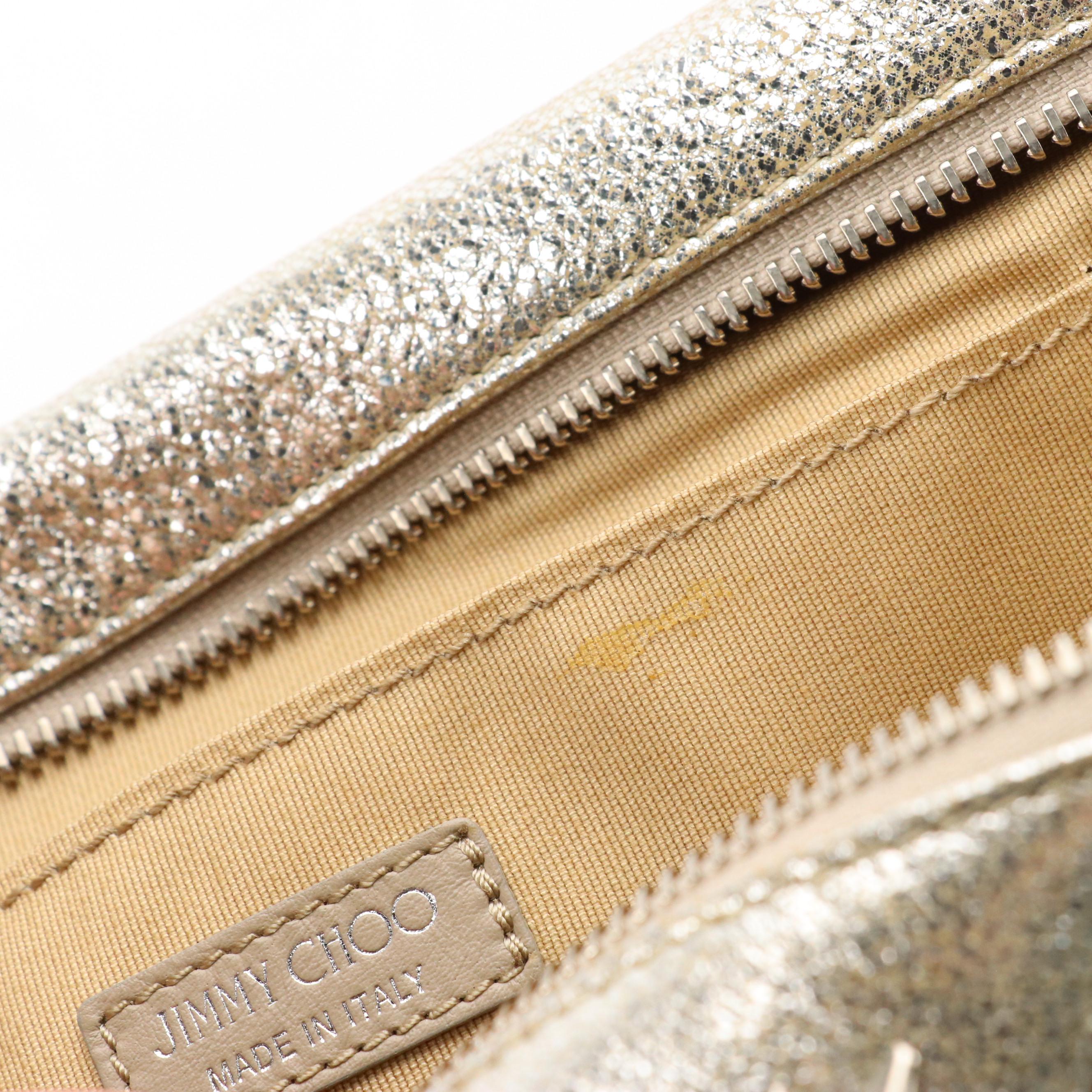 Jimmy Choo Zena Clutch in Silver Tone Star Studded Metallic Silver Leather