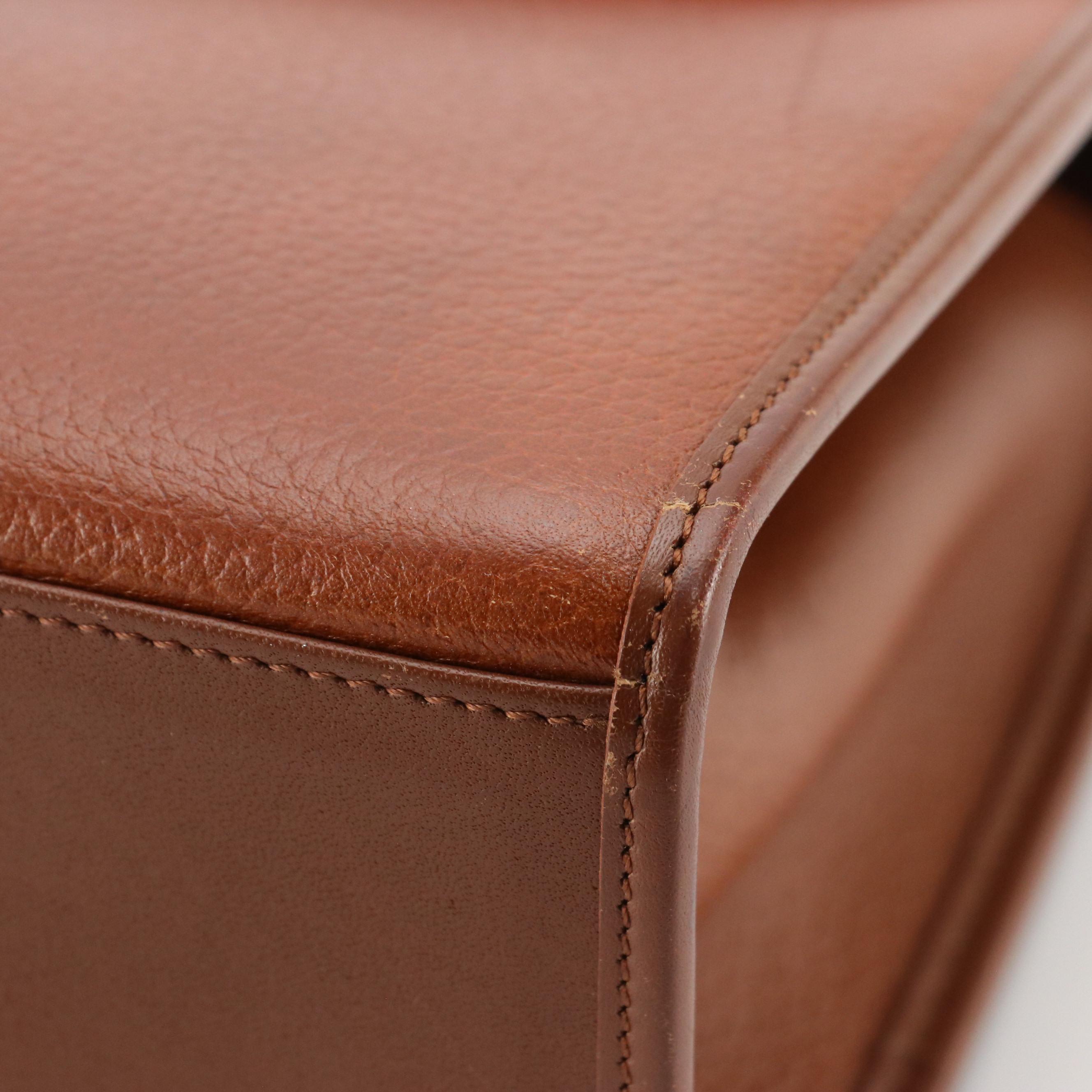 Burberrys Front Flap Top Handle Bag in Brown Grained Leather