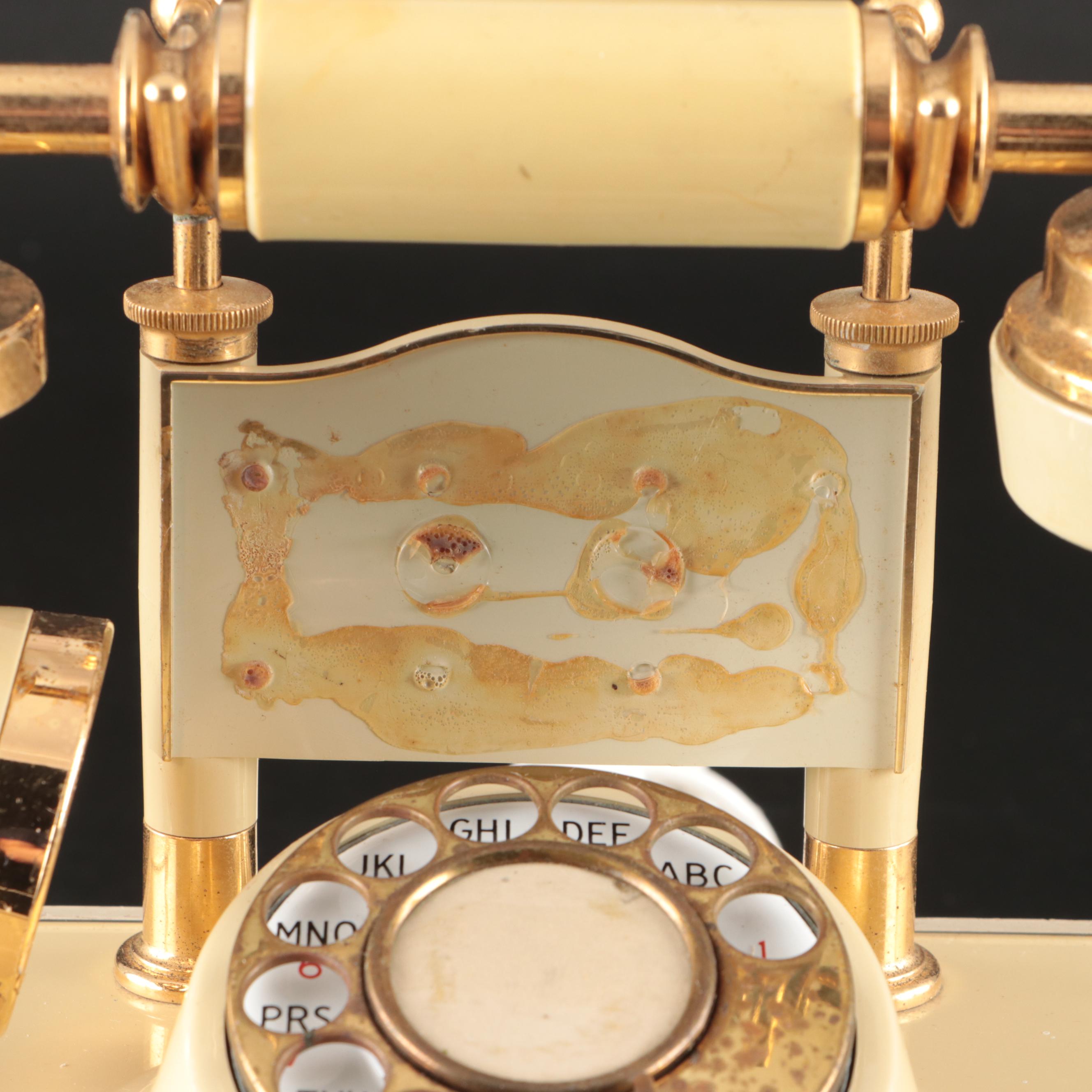 Art Nouveau Style Brass Vanity Mirror, Deco-Tel Rotary Phone, and Lanshire Clock