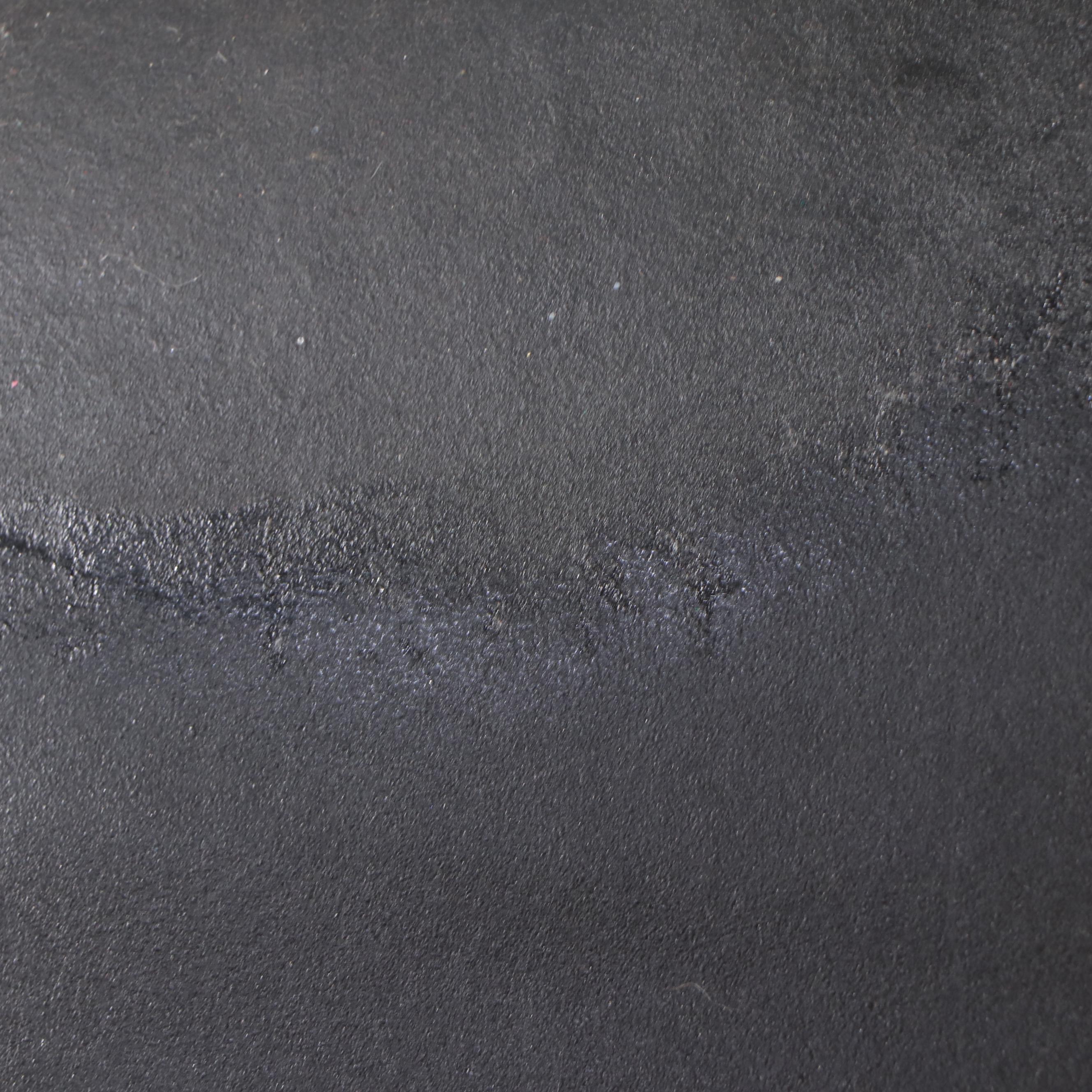 Calia Black Leather Armchair with Ottoman