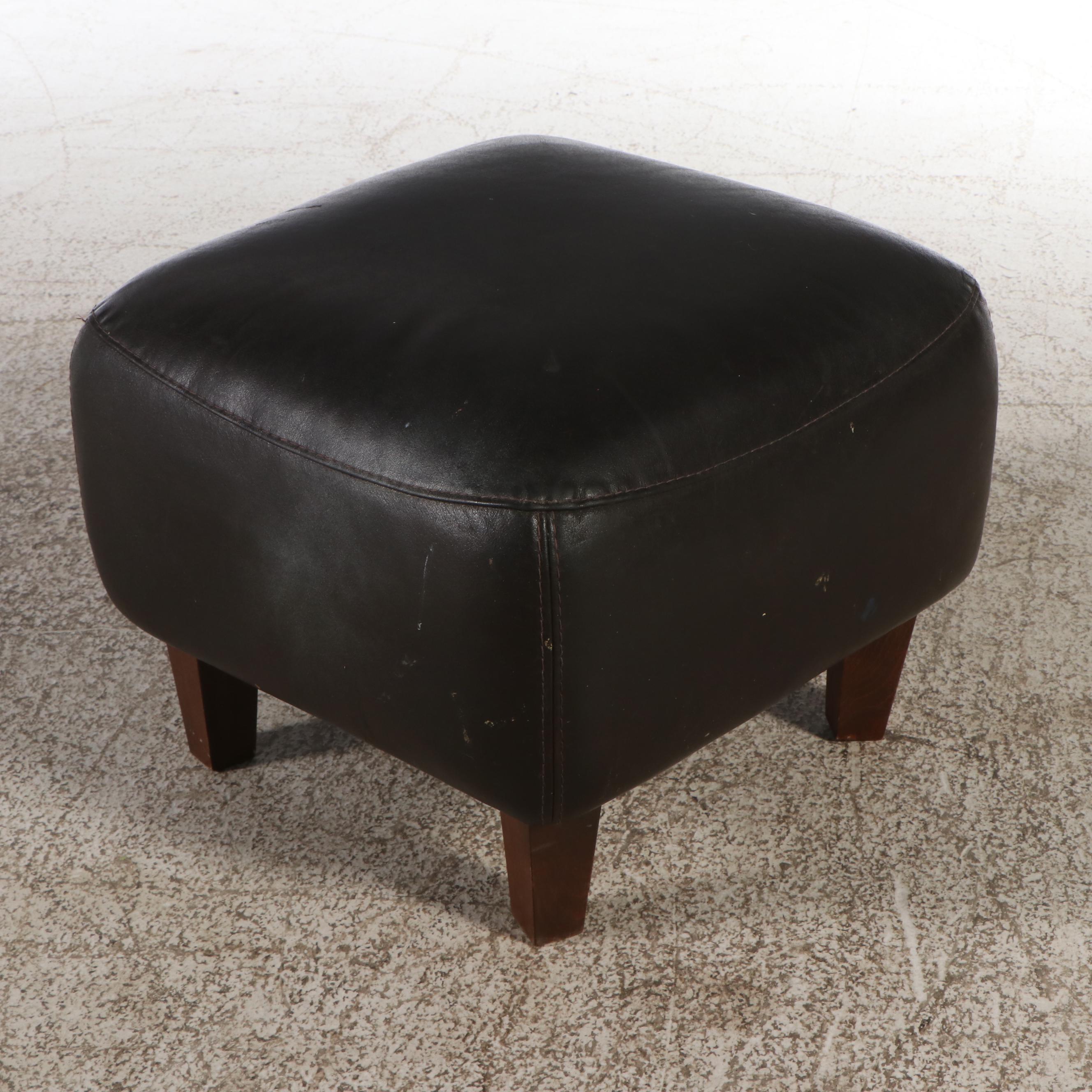 Calia Black Leather Armchair with Ottoman