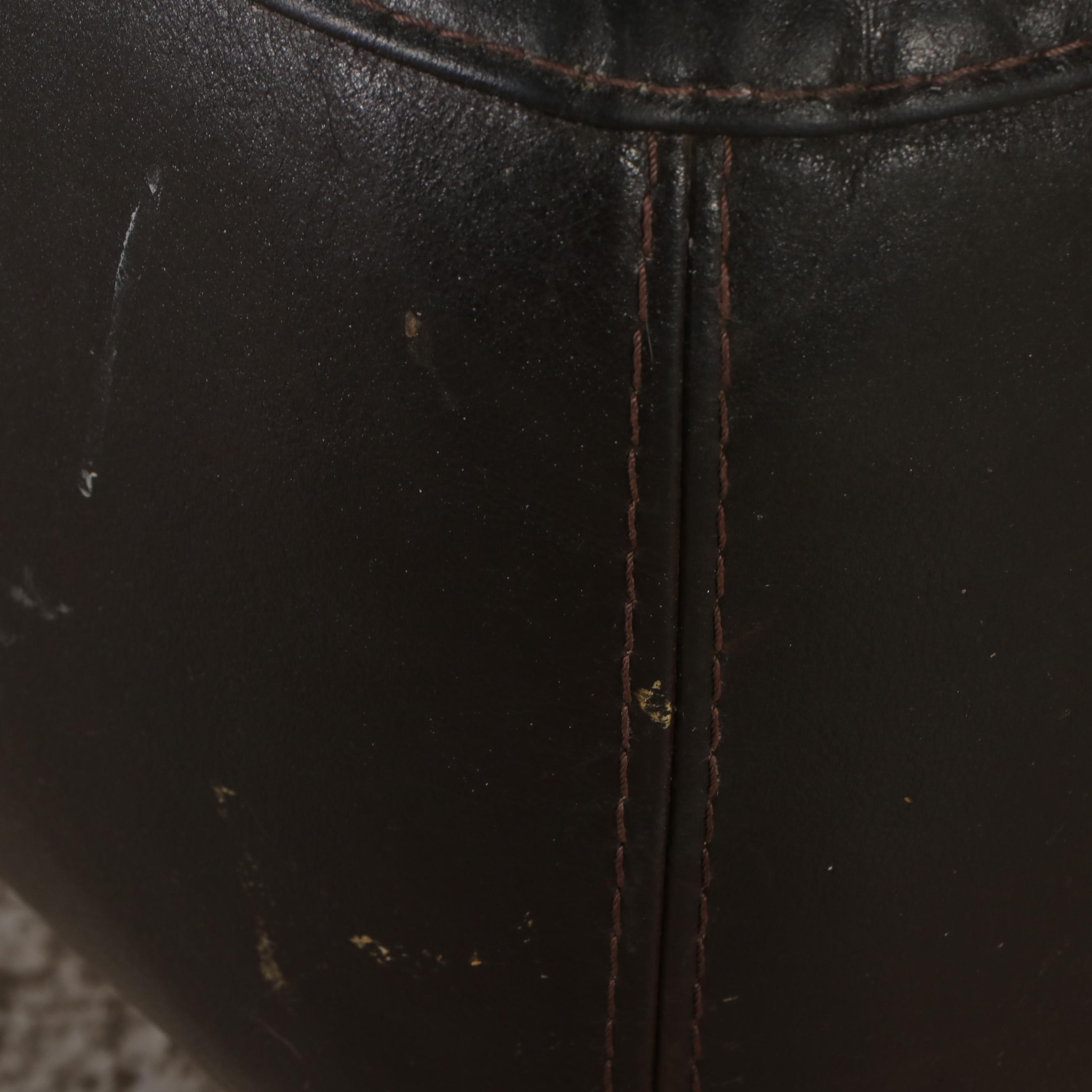 Calia Black Leather Armchair with Ottoman