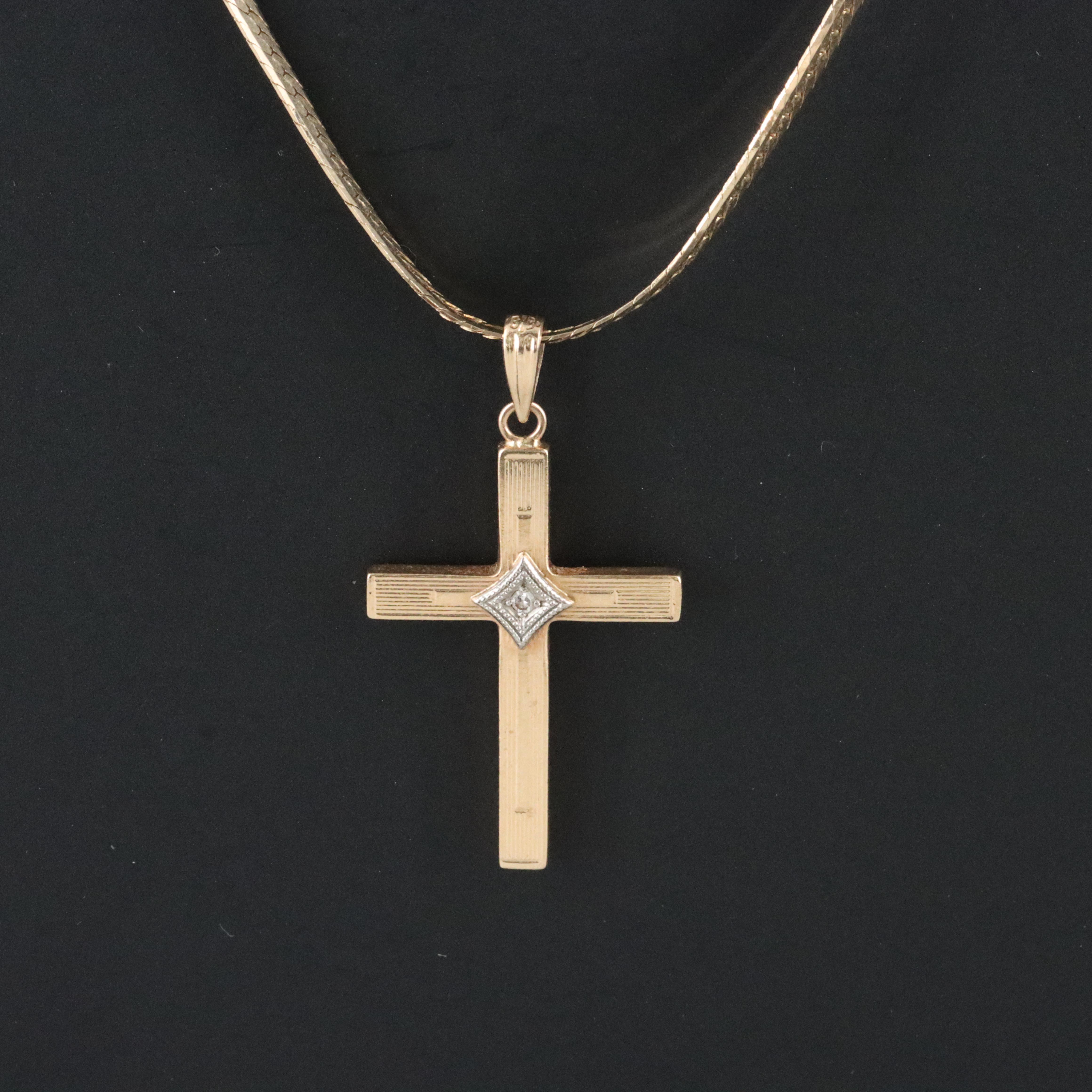 10K 0.01 CT Diamond Cross Pendant on 14K Herringbone Necklace