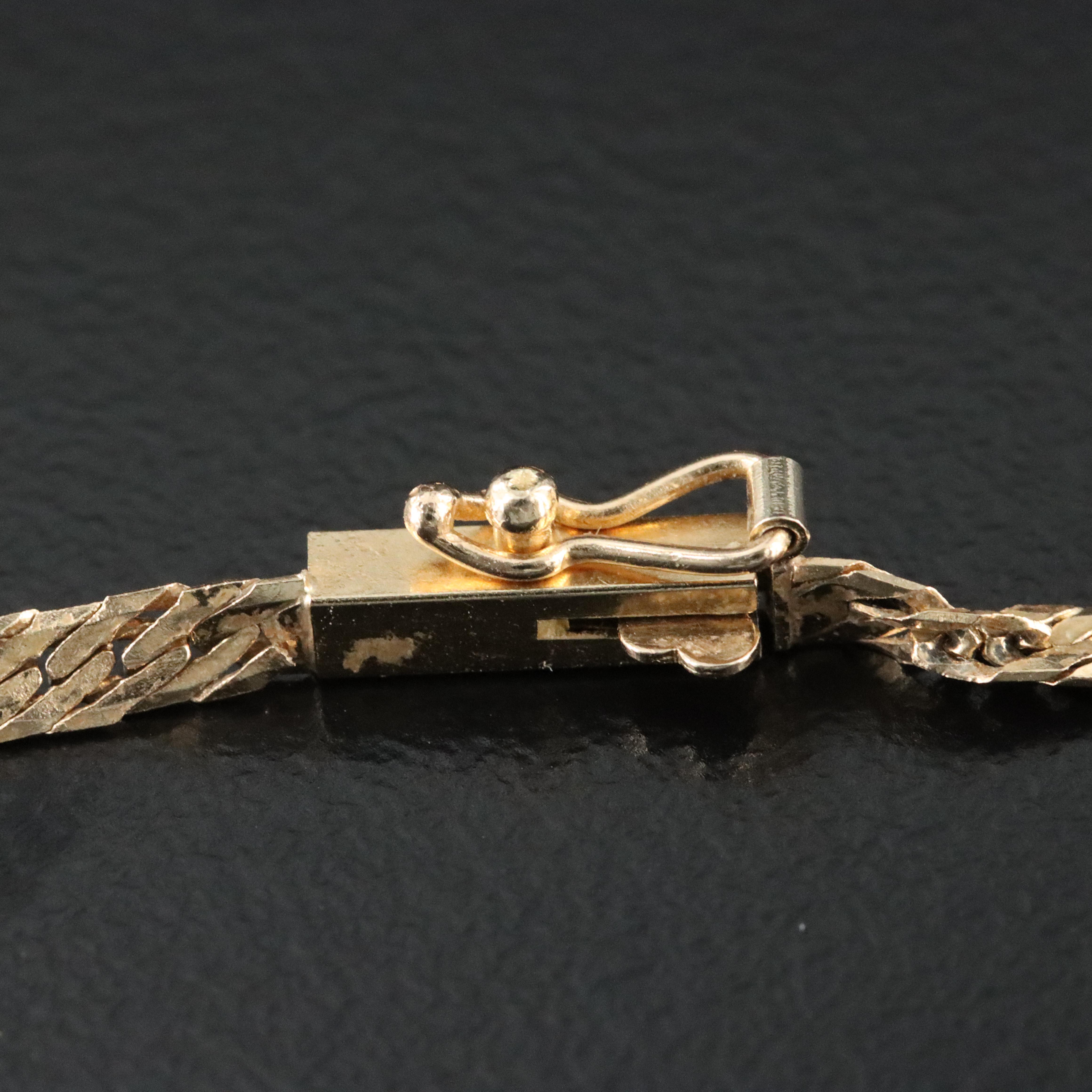 10K 0.01 CT Diamond Cross Pendant on 14K Herringbone Necklace