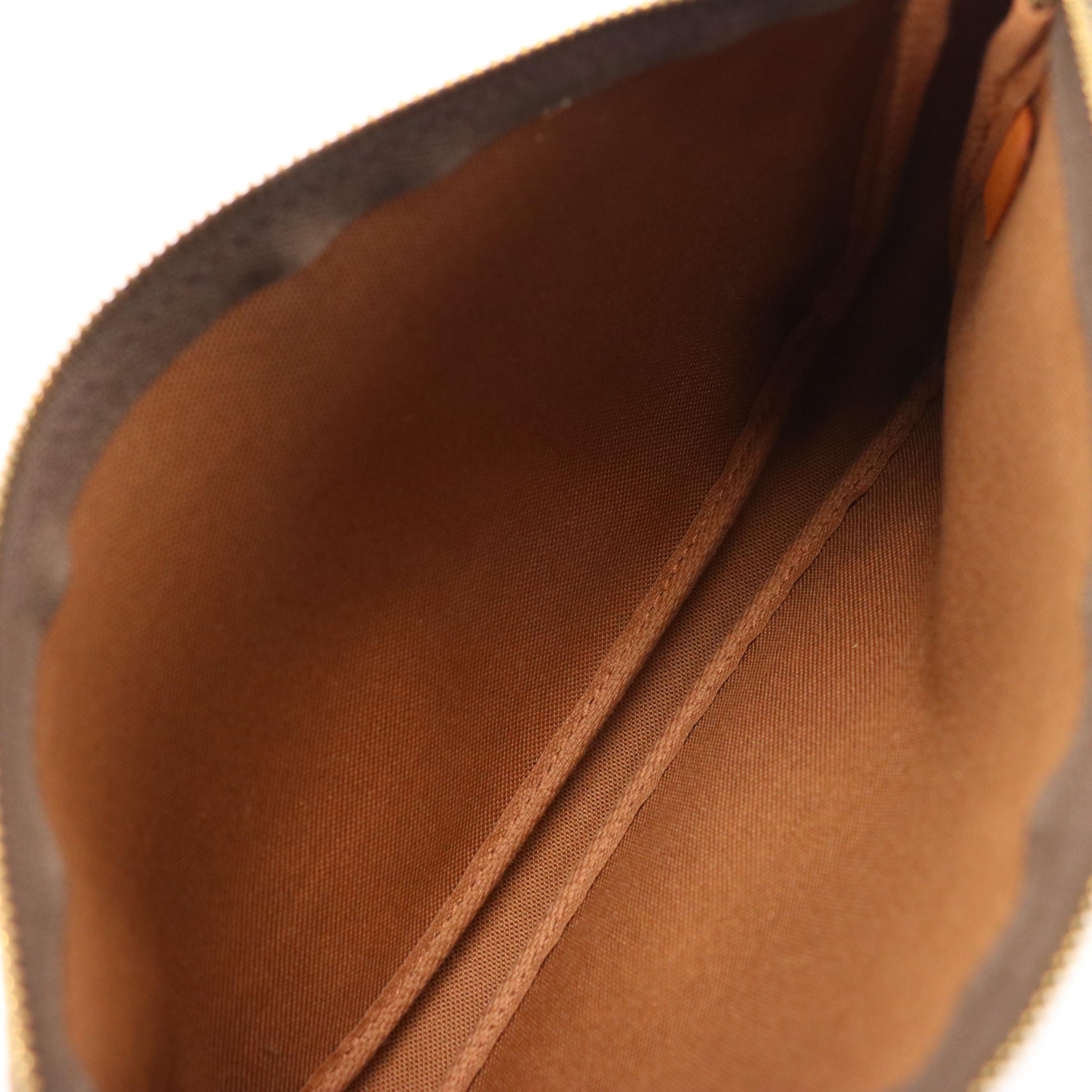 Louis Vuitton Zip Pochette in Monogram Canvas and Leather