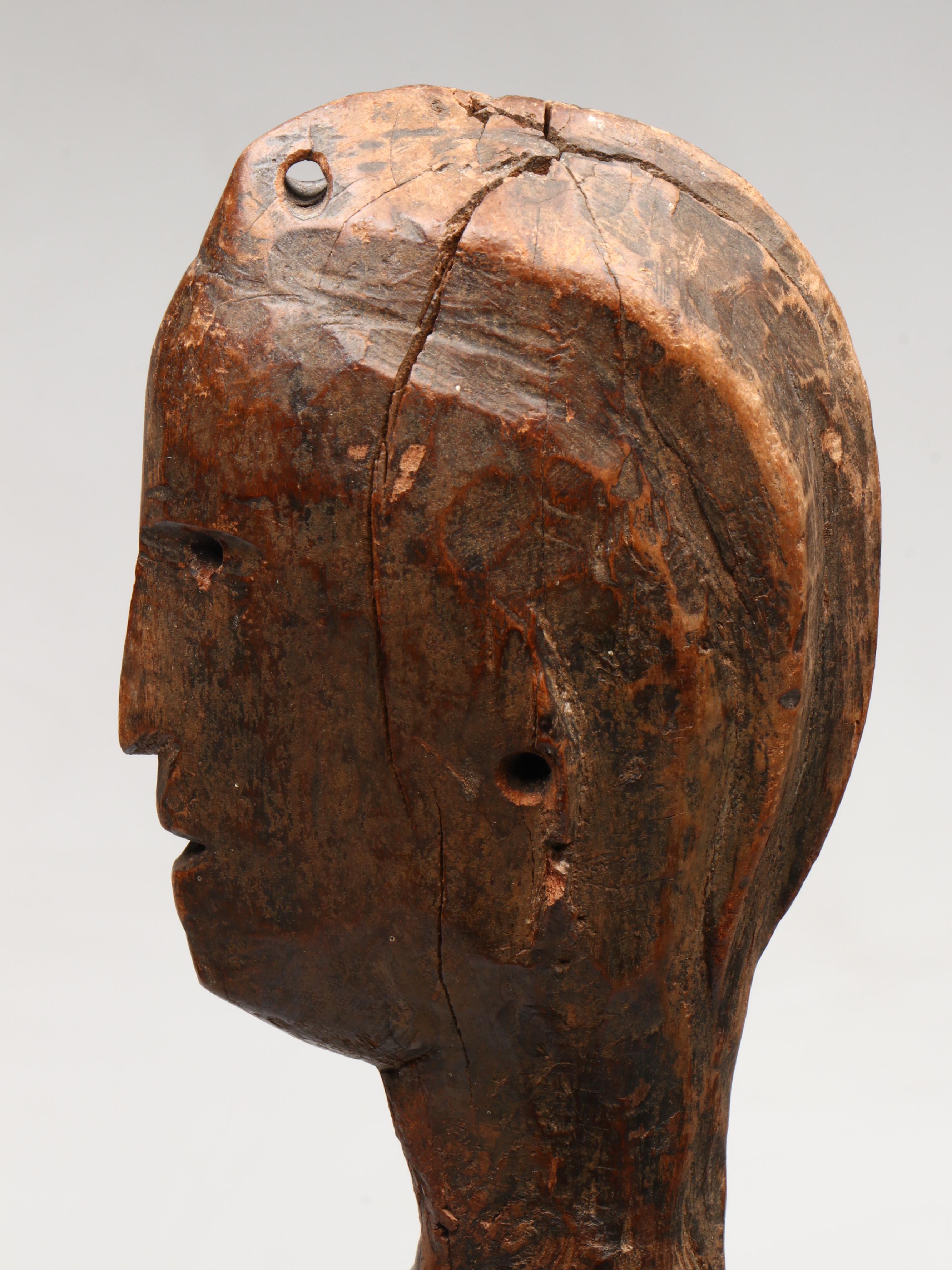West African Wood Carving of Nude Female Figure, 20th Century