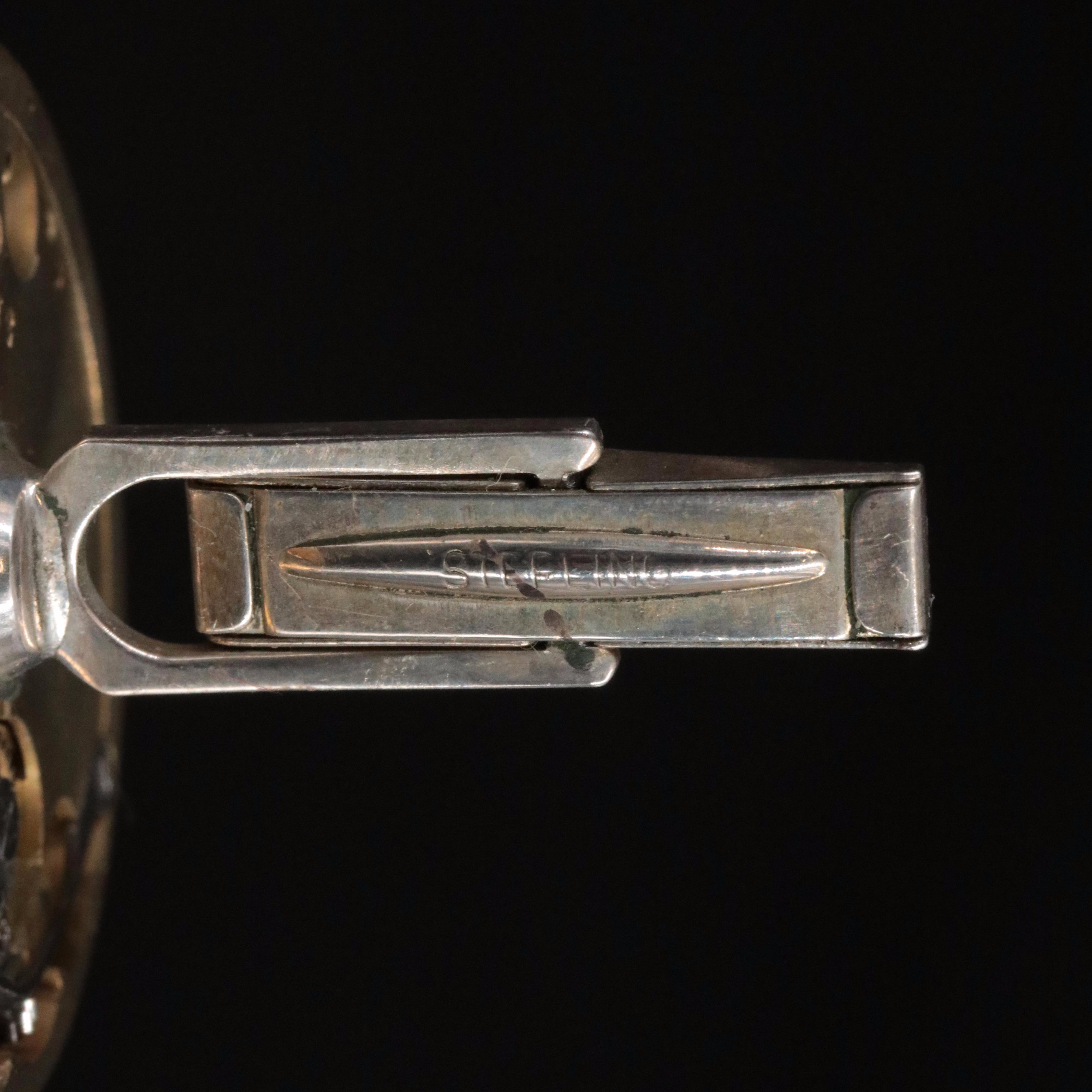 A Pair of Mechanical Watch Movement Cufflinks