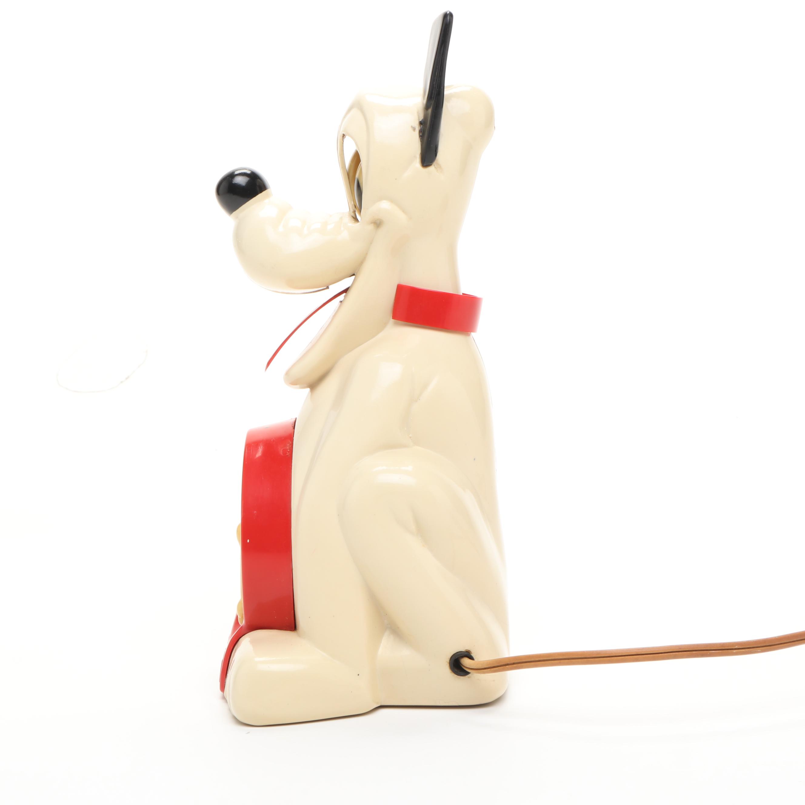Allied Mfg. Company Plastic Pluto Electric Clock, Mid-20th Century