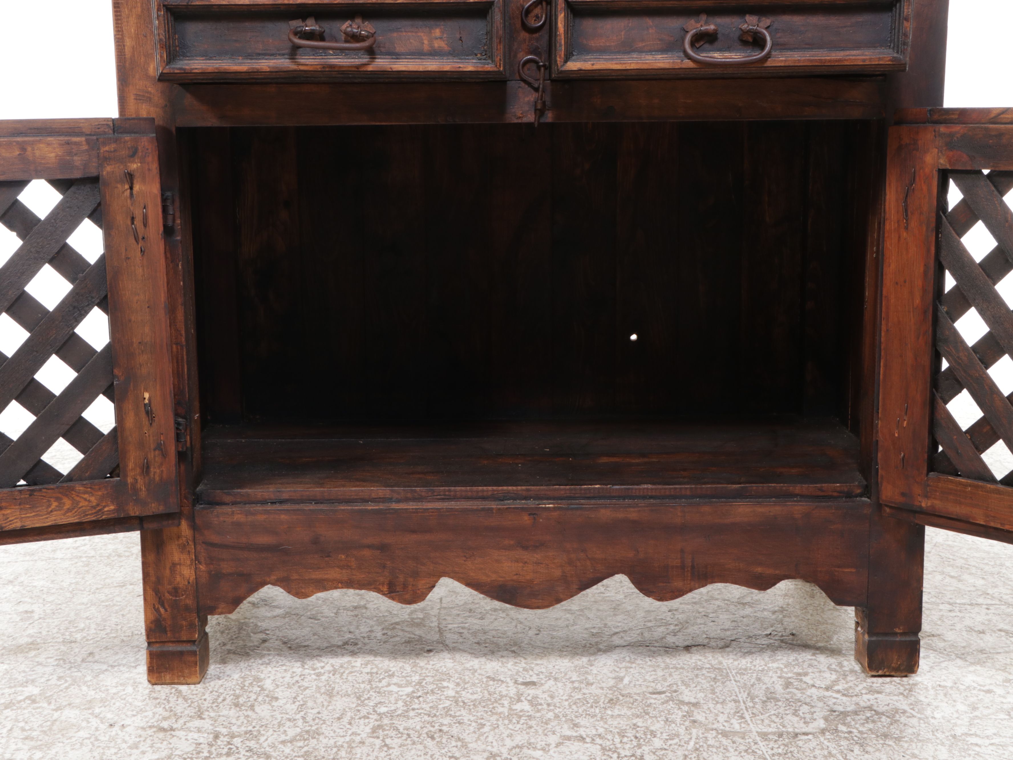 Rustic Dark Stained Wood Media Cabinet with Lattice Doors