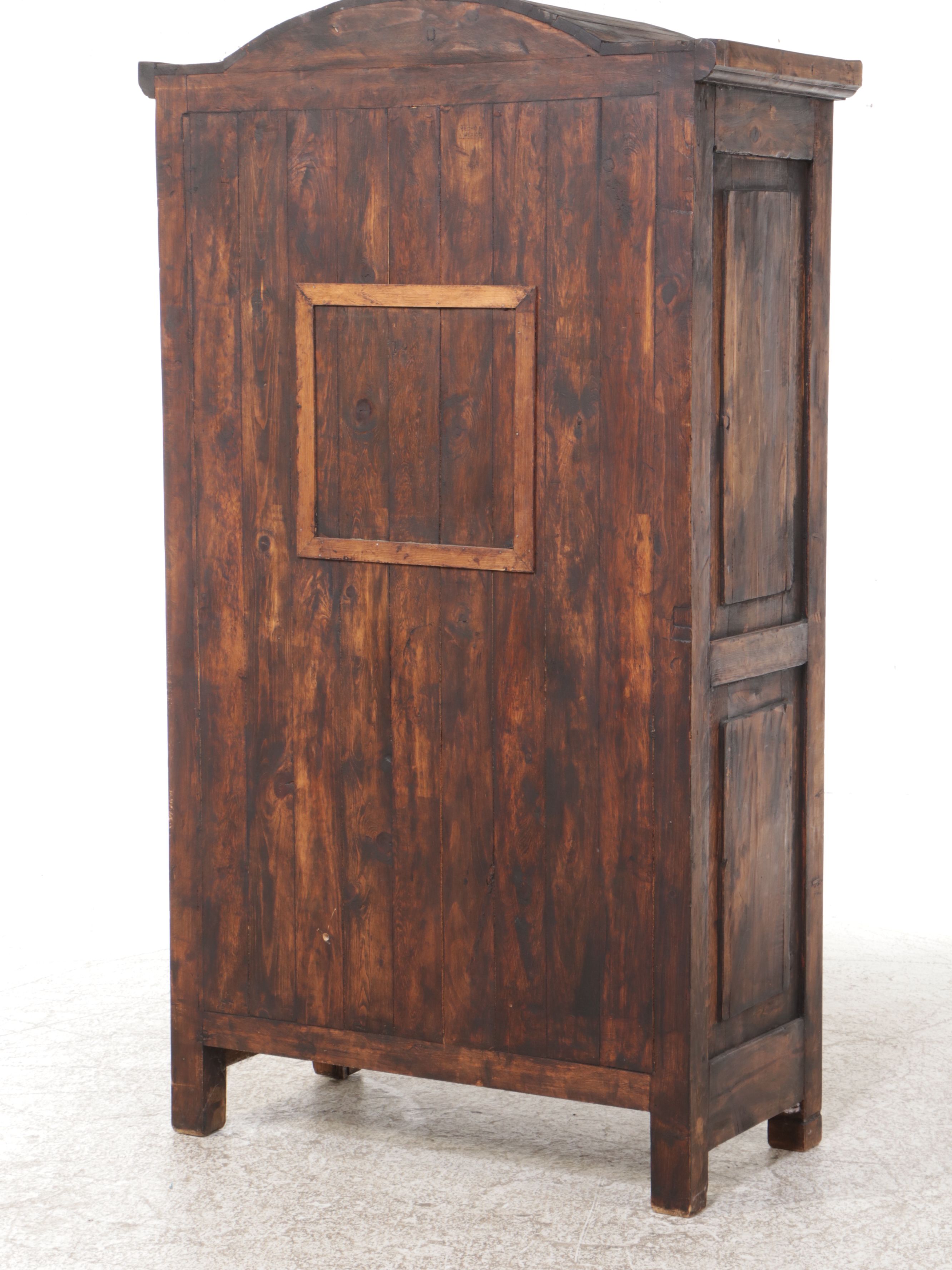 Rustic Dark Stained Wood Media Cabinet with Lattice Doors