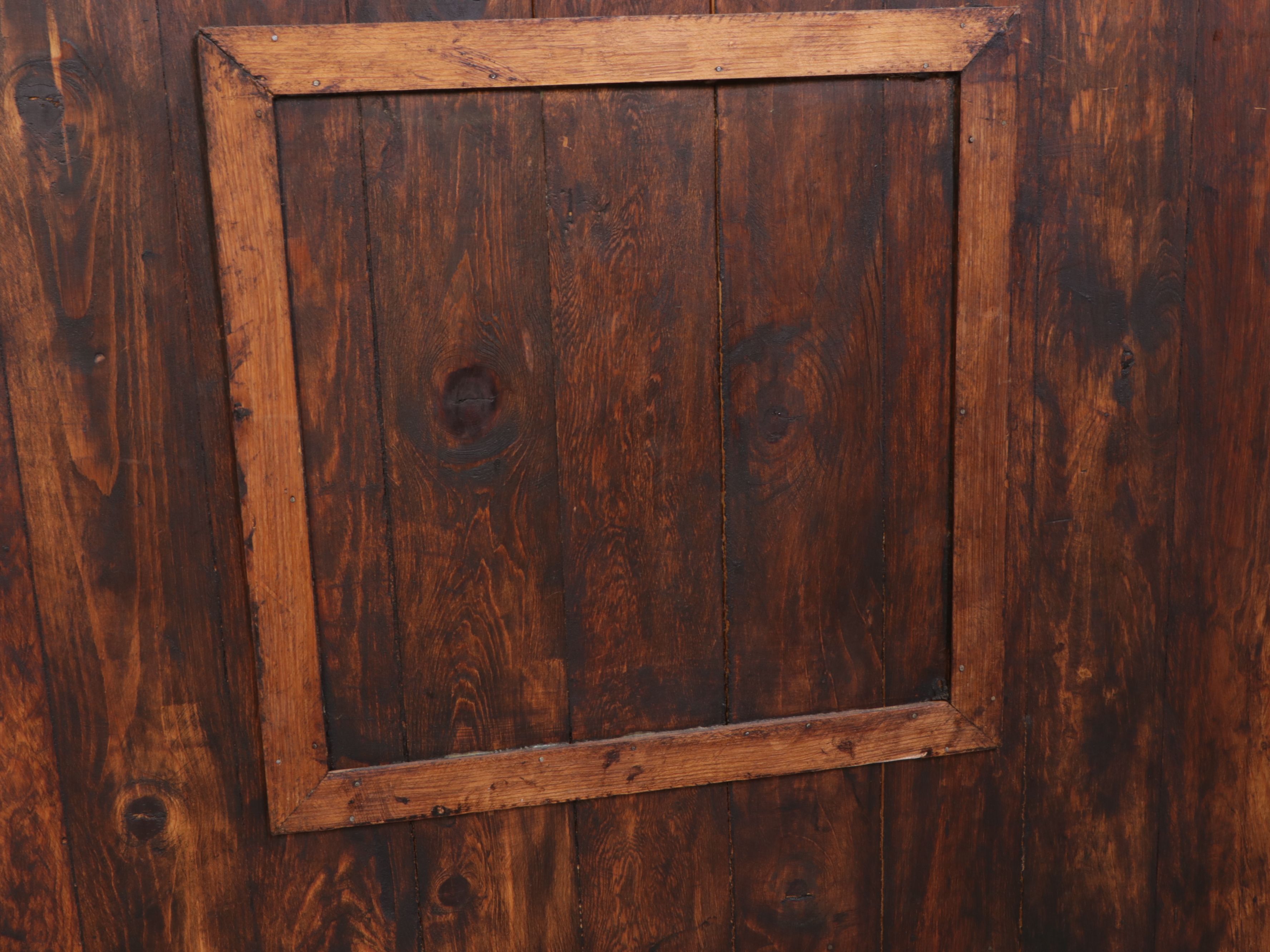Rustic Dark Stained Wood Media Cabinet with Lattice Doors