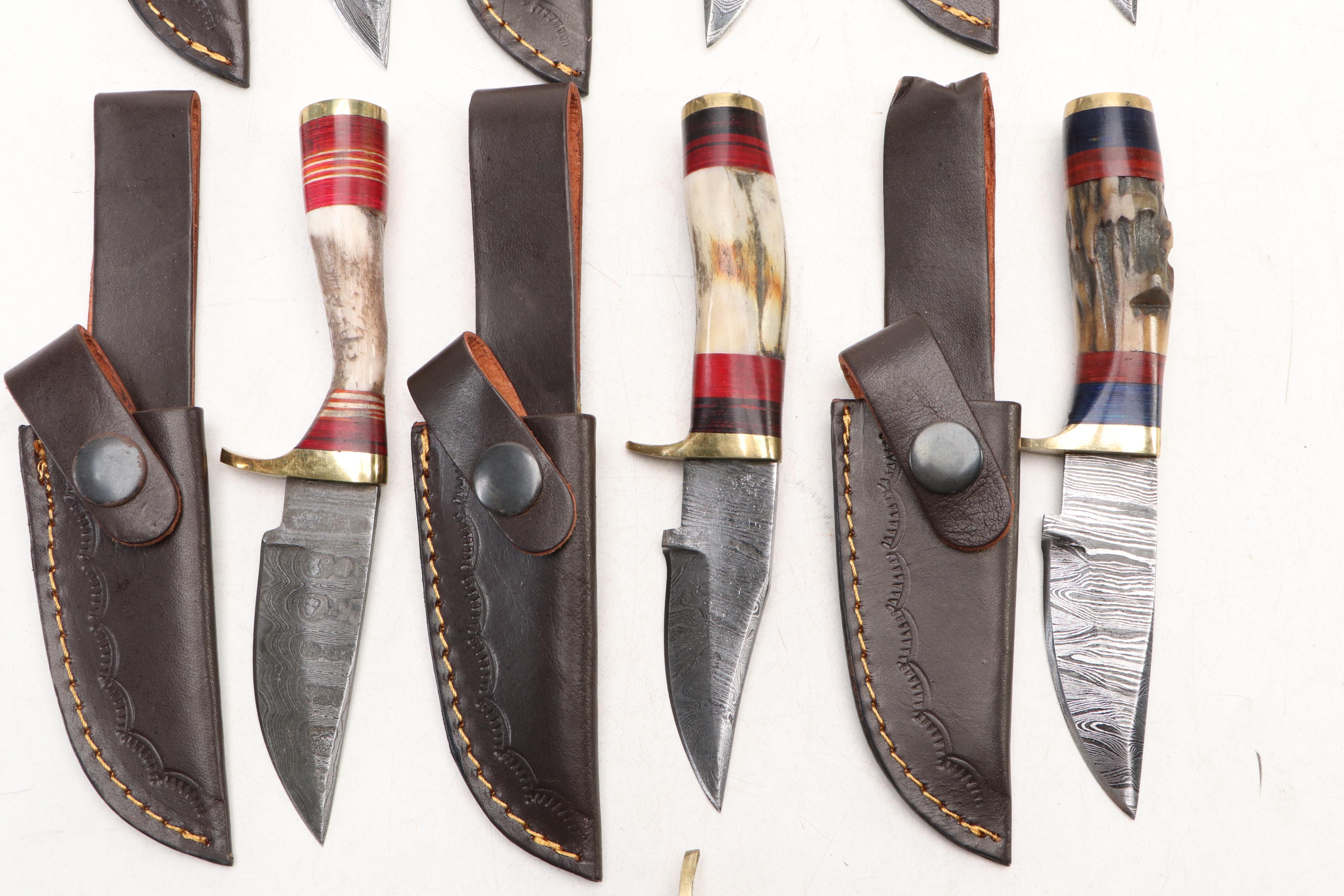 Damascus Steel and Antler Handled Skinner Knives in Leather Scabbards