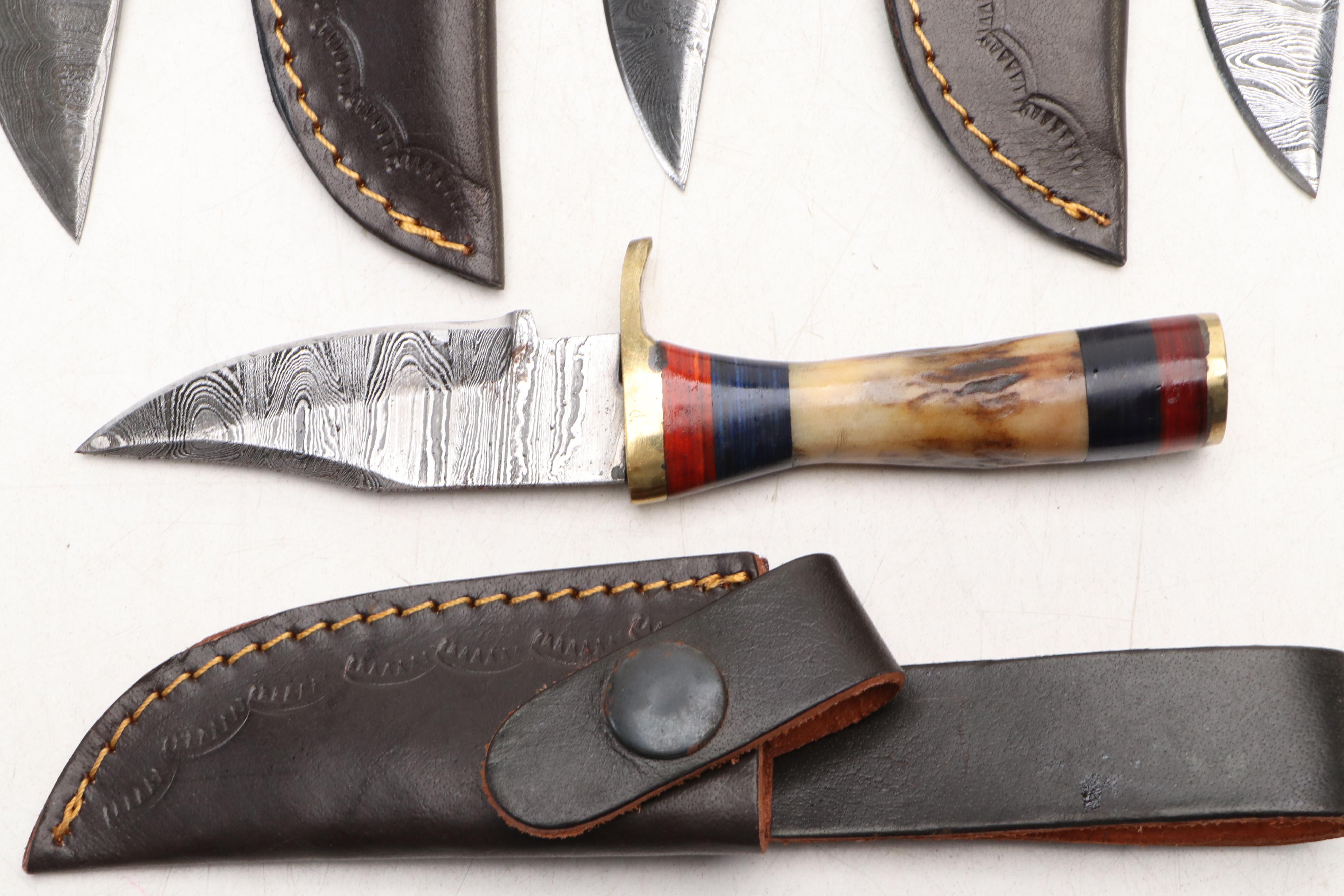 Damascus Steel and Antler Handled Skinner Knives in Leather Scabbards