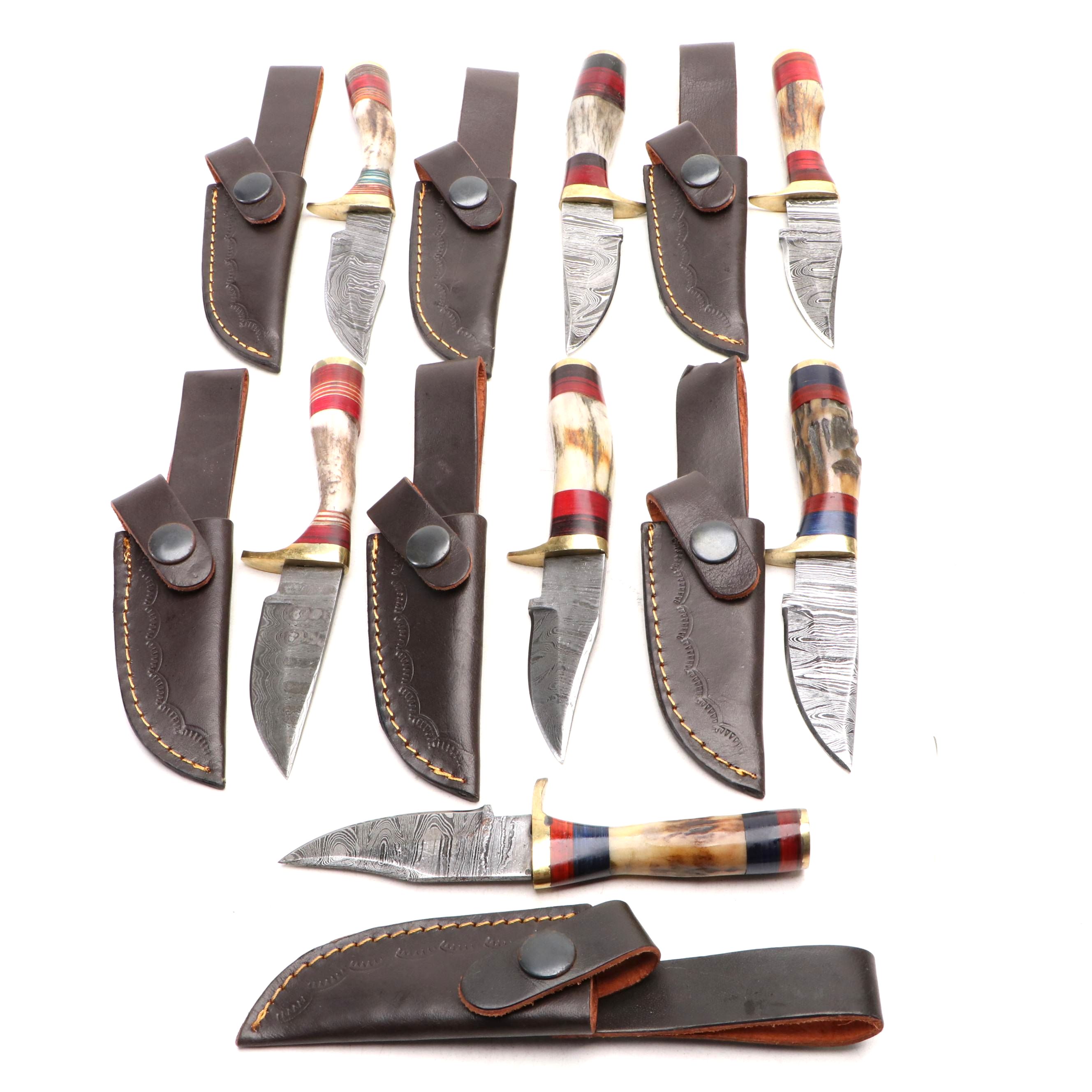 Damascus Steel and Antler Handled Skinner Knives in Leather Scabbards