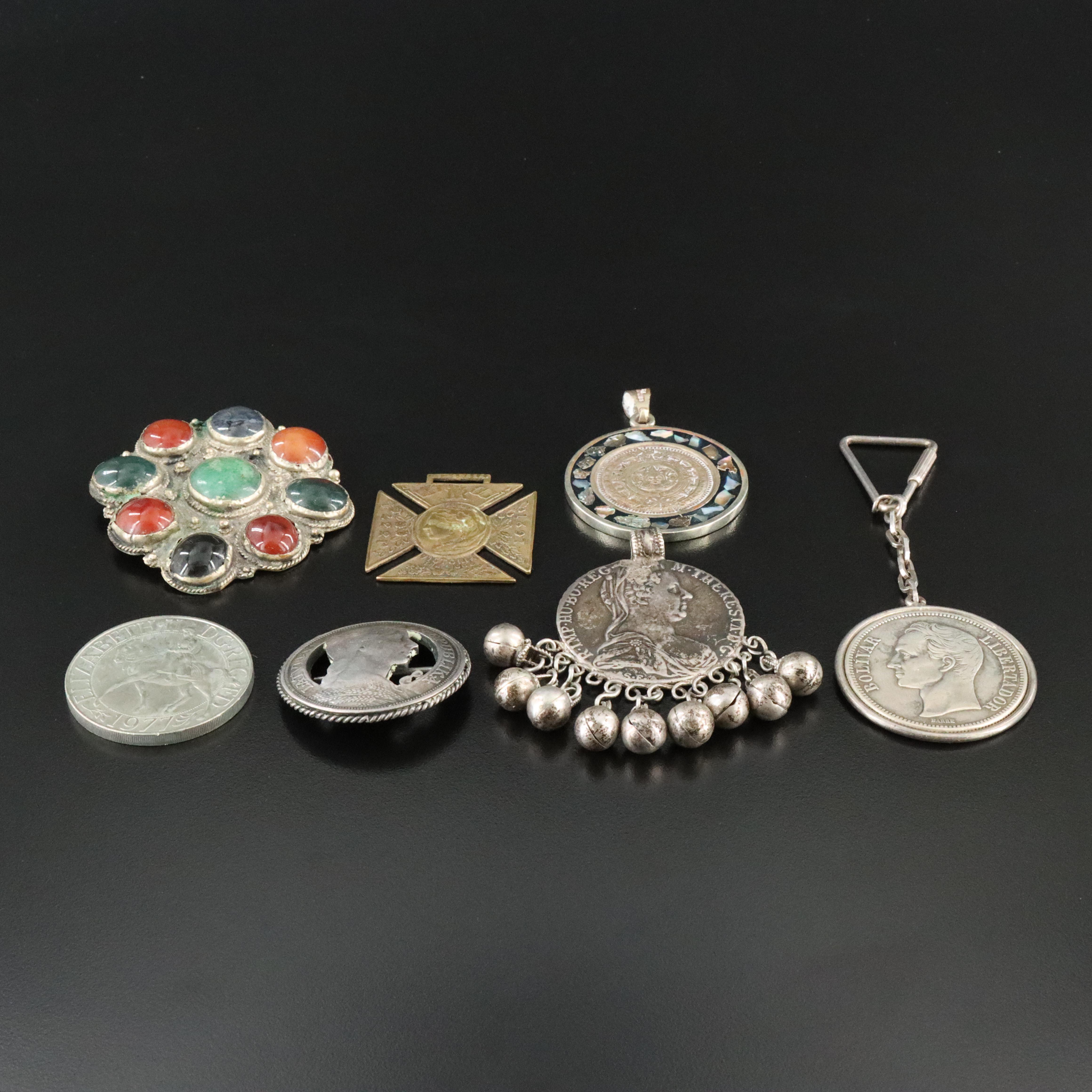 Sterling, Abalone and Coins Featured in Pendant, Brooch and Key Chain Collection