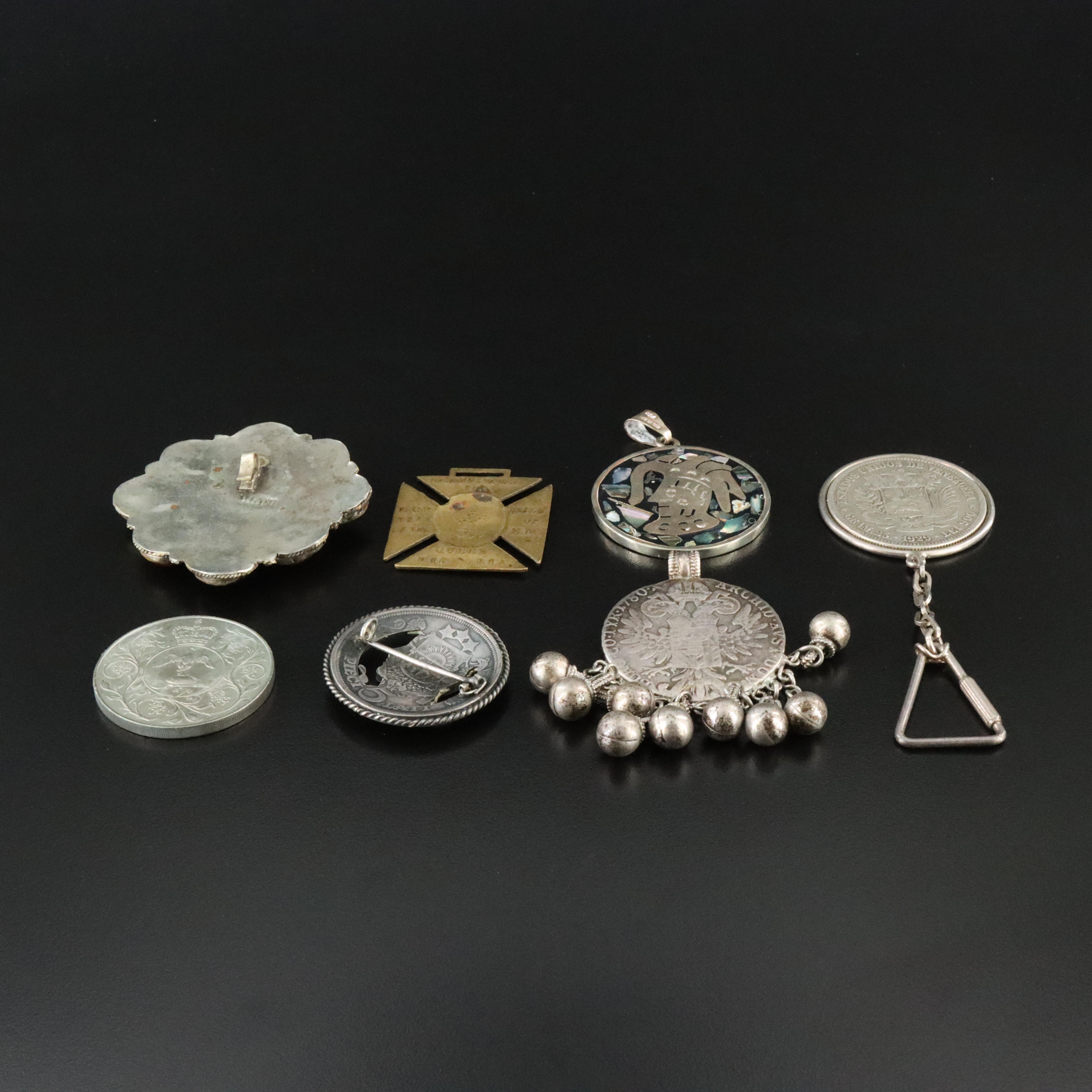 Sterling, Abalone and Coins Featured in Pendant, Brooch and Key Chain Collection
