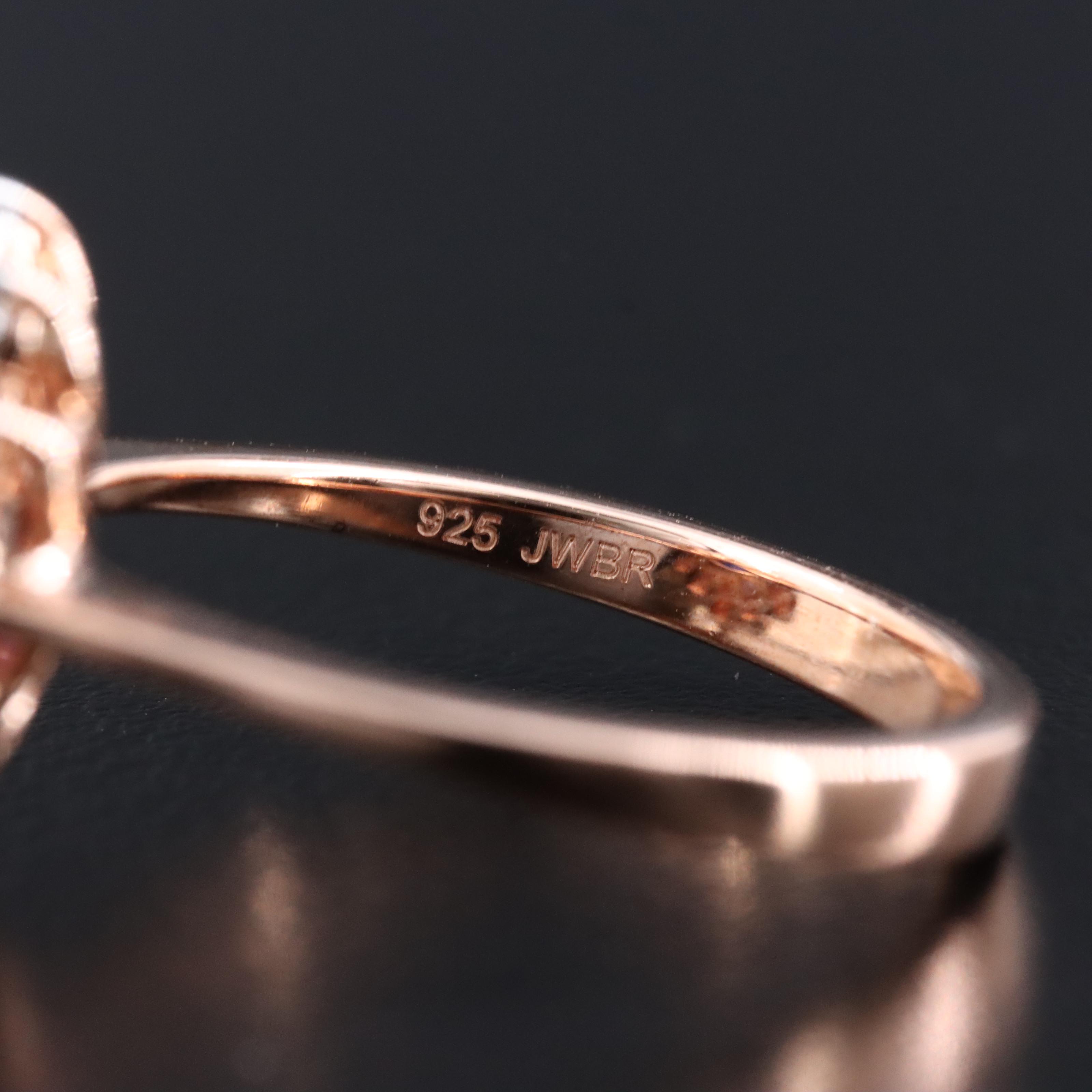 Sterling Sapphire and Diamond Halo Ring