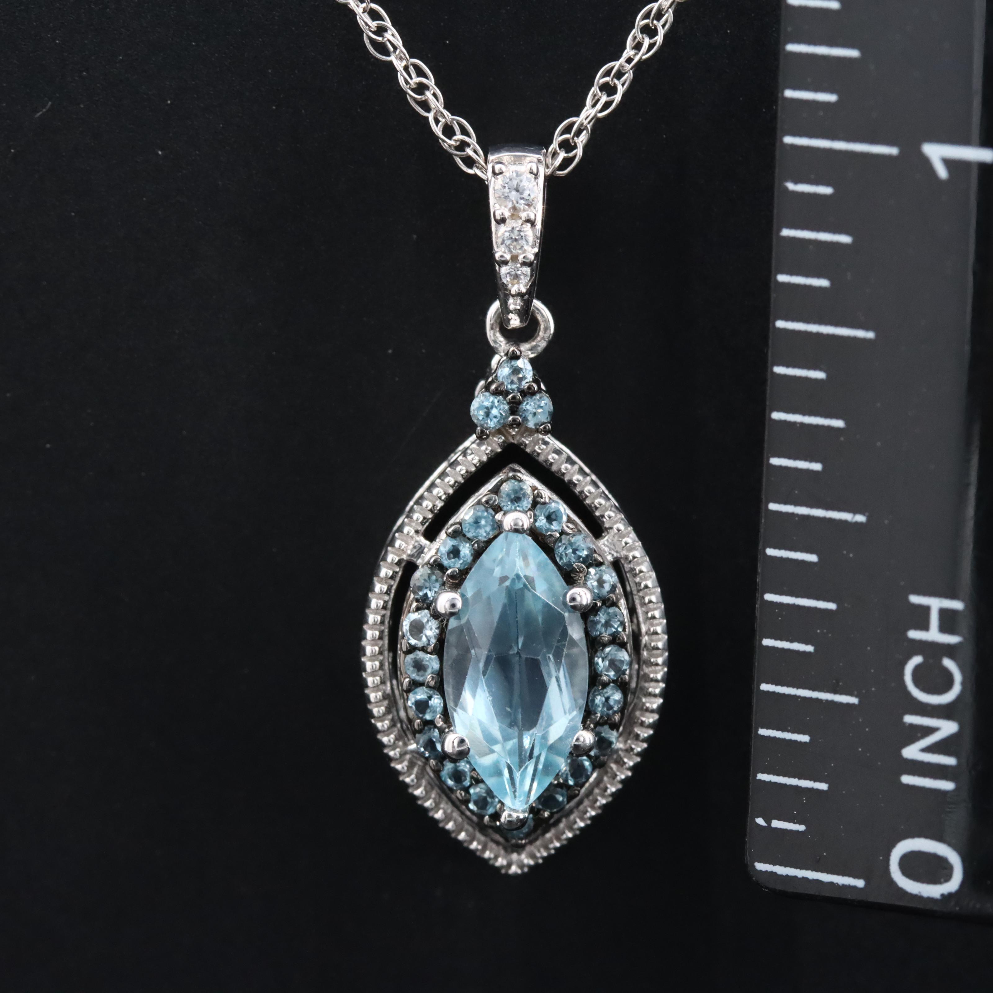 Sterling Sky Blue Topaz Halo Navette Pendant Necklace with Sapphire Accents