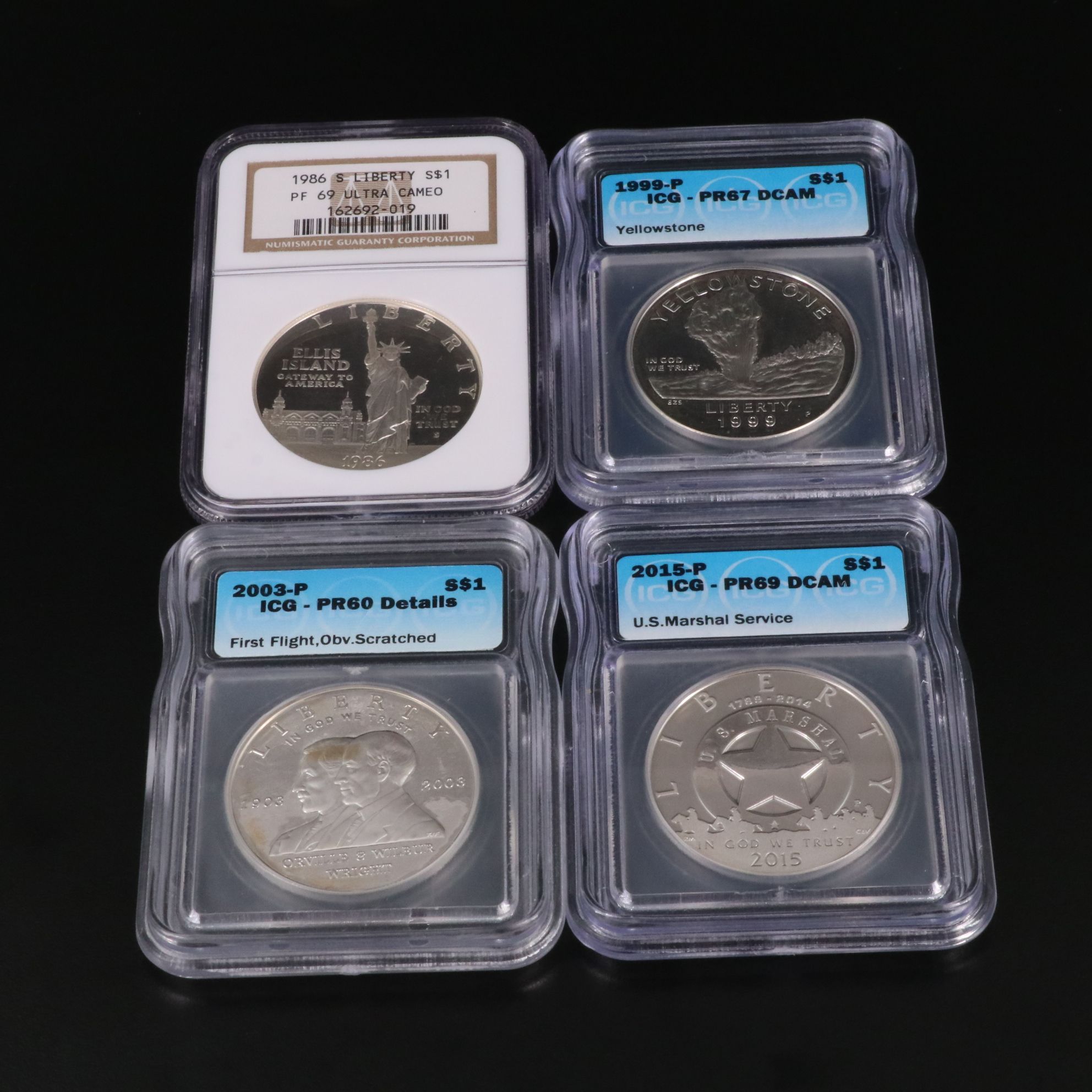 Four Different Modern Commemorative Silver Dollars