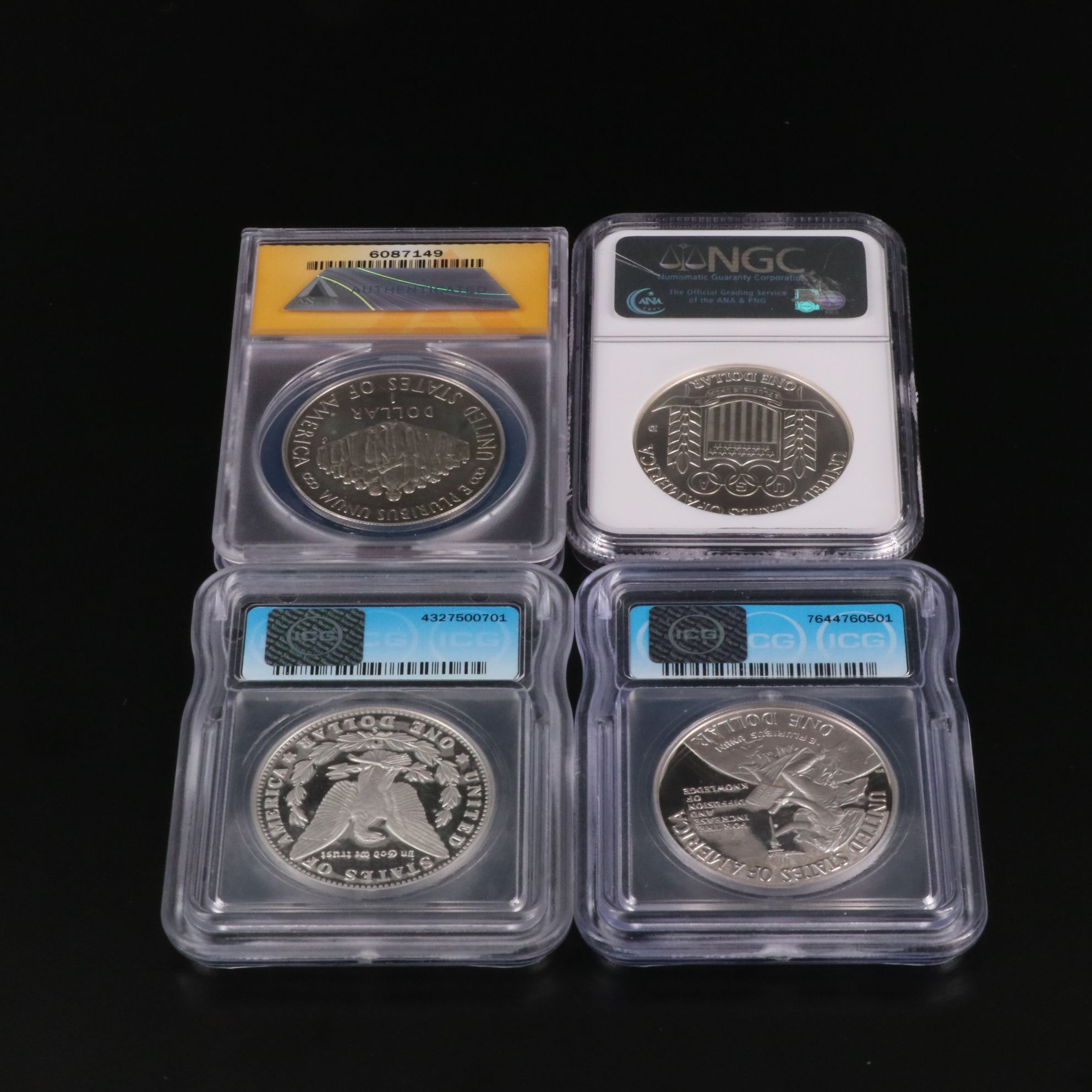 Four Modern Commemorative Silver Dollars