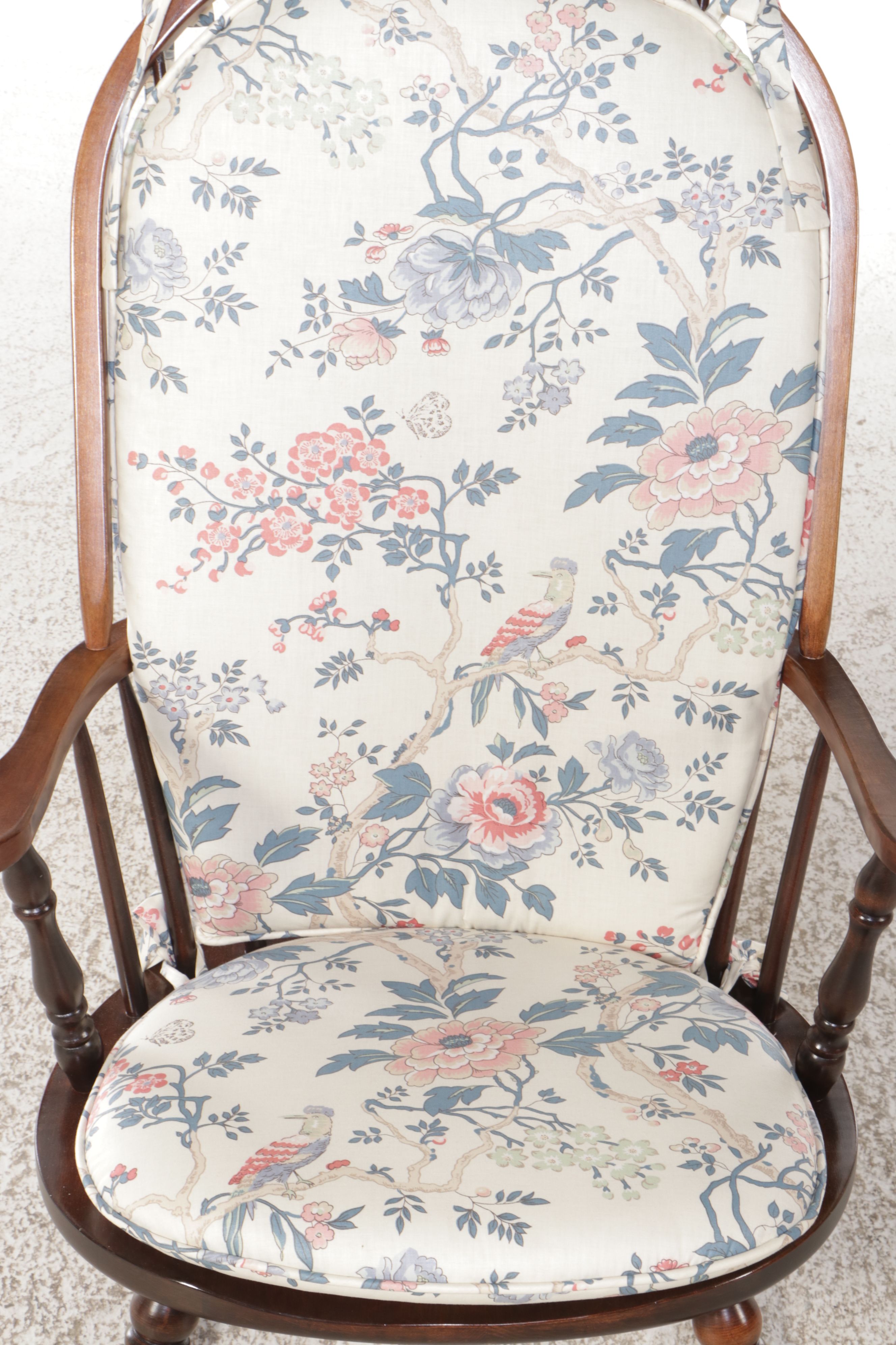 Turned Mahogany Wingback Rocking Chair with Floral Cushion