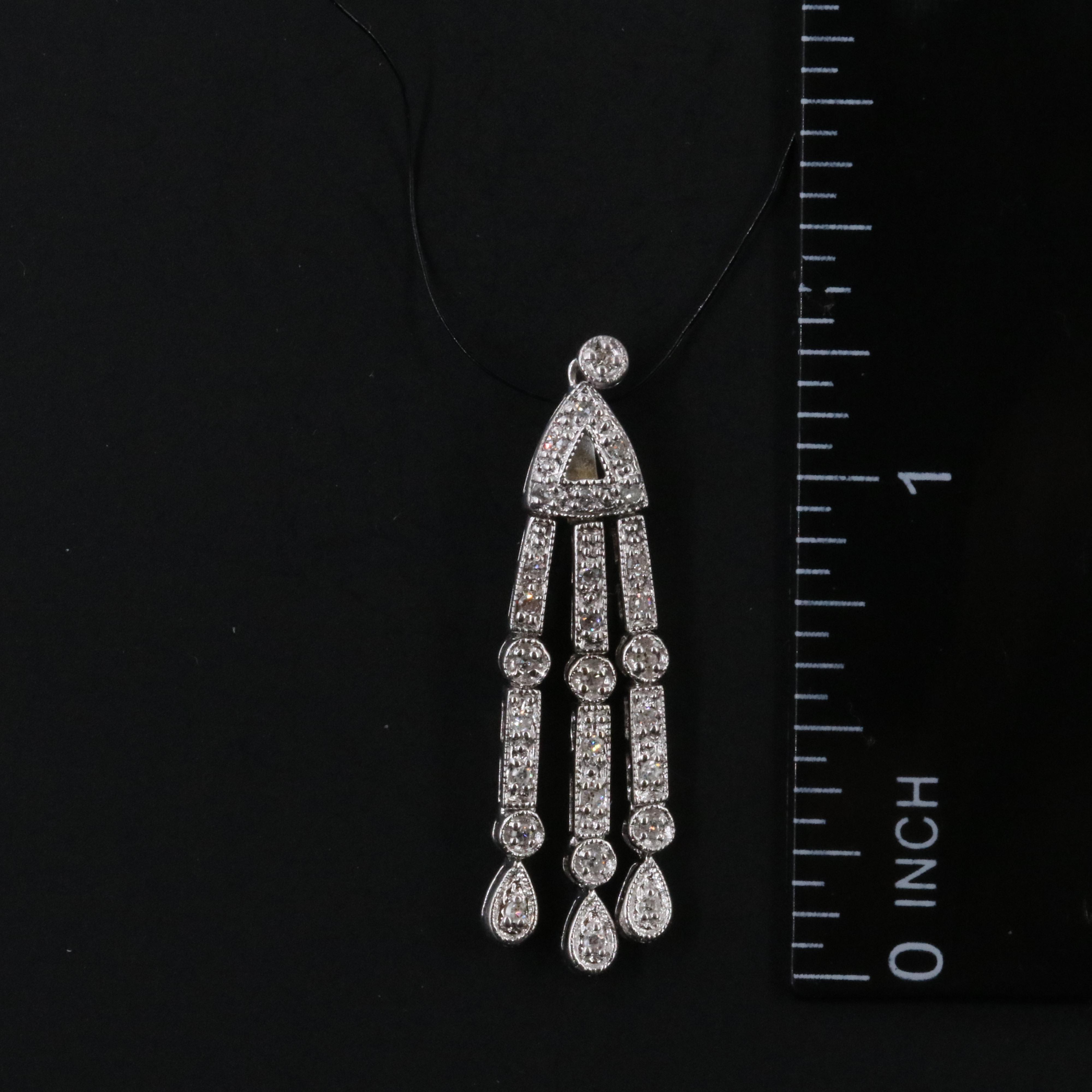 14K 0.26 CTW Diamond Pendant