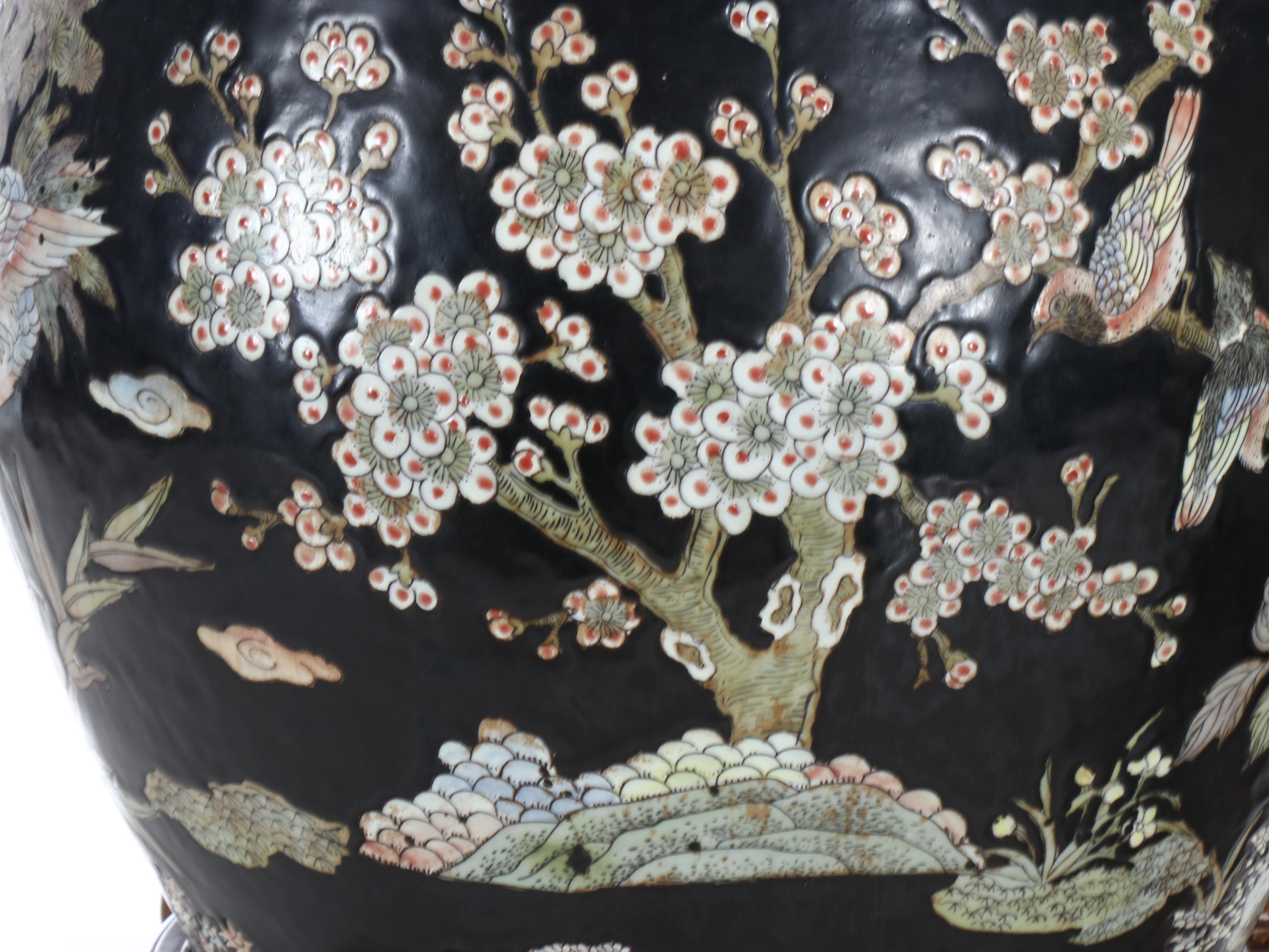 Pair of Chinese Porcelain Famille Noire Fishbowl Planters with Stands