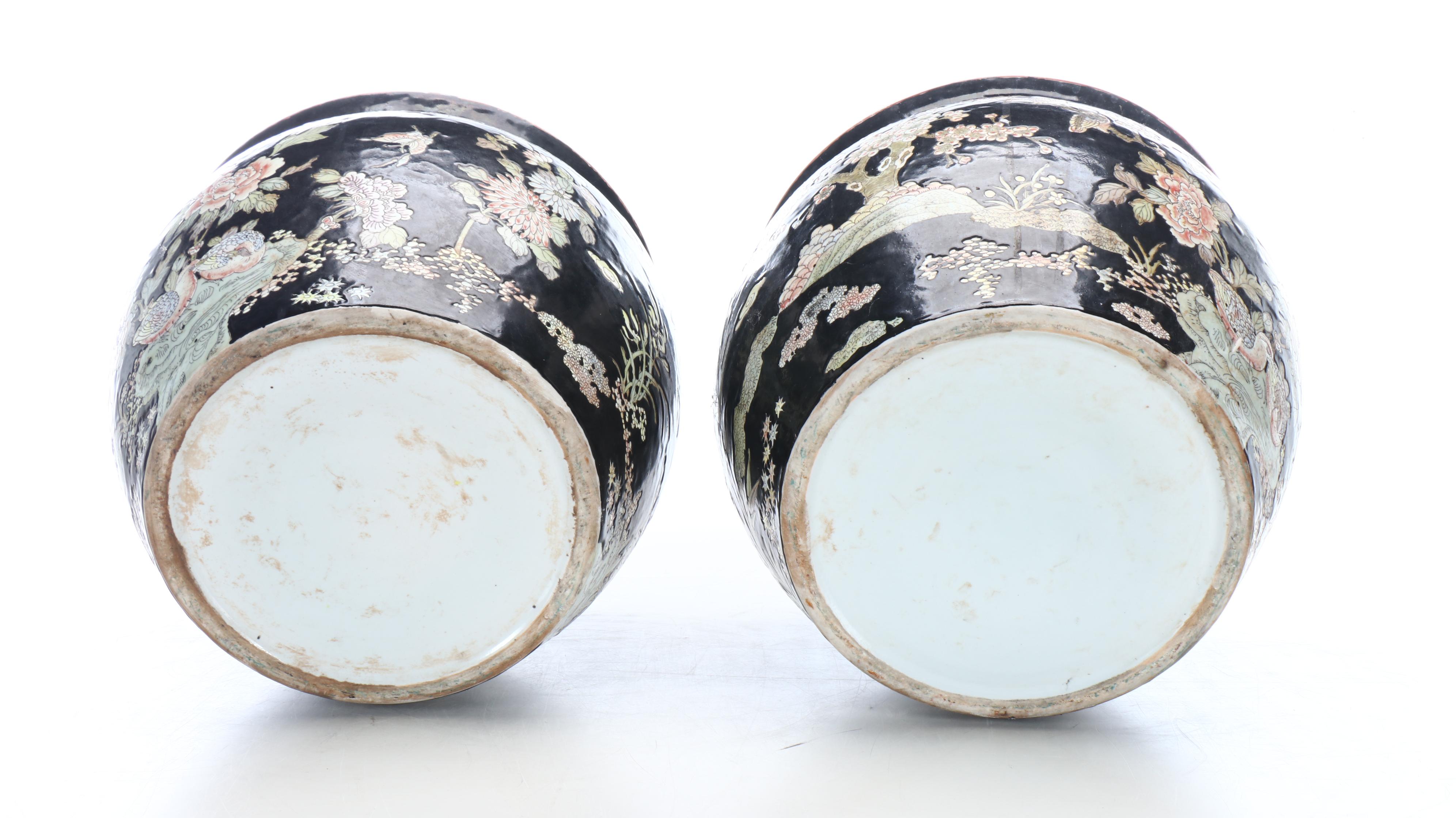 Pair of Chinese Porcelain Famille Noire Fishbowl Planters with Stands