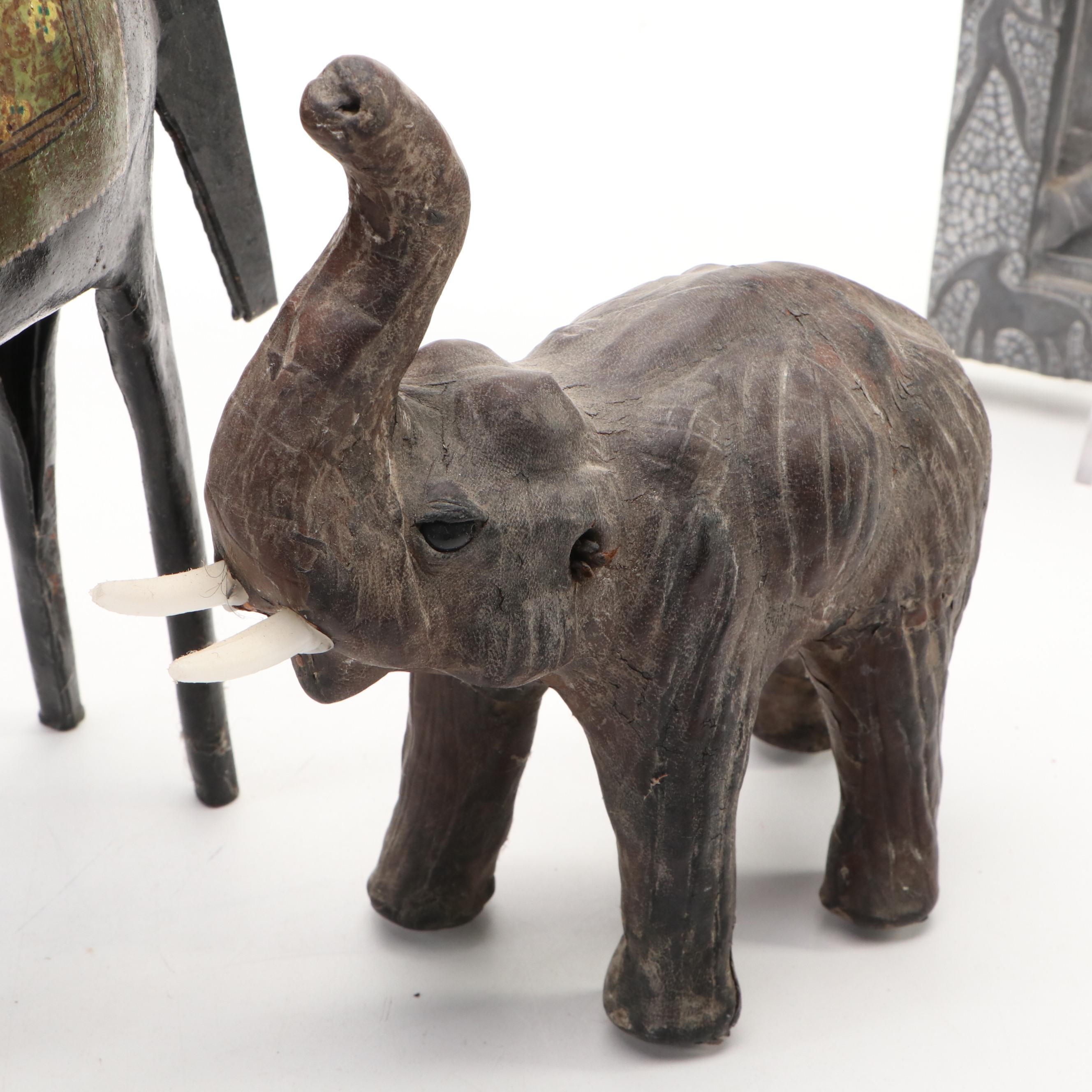 Carved Soapstone, Banded Calcite, Wood and Metal Elephants & Plaque