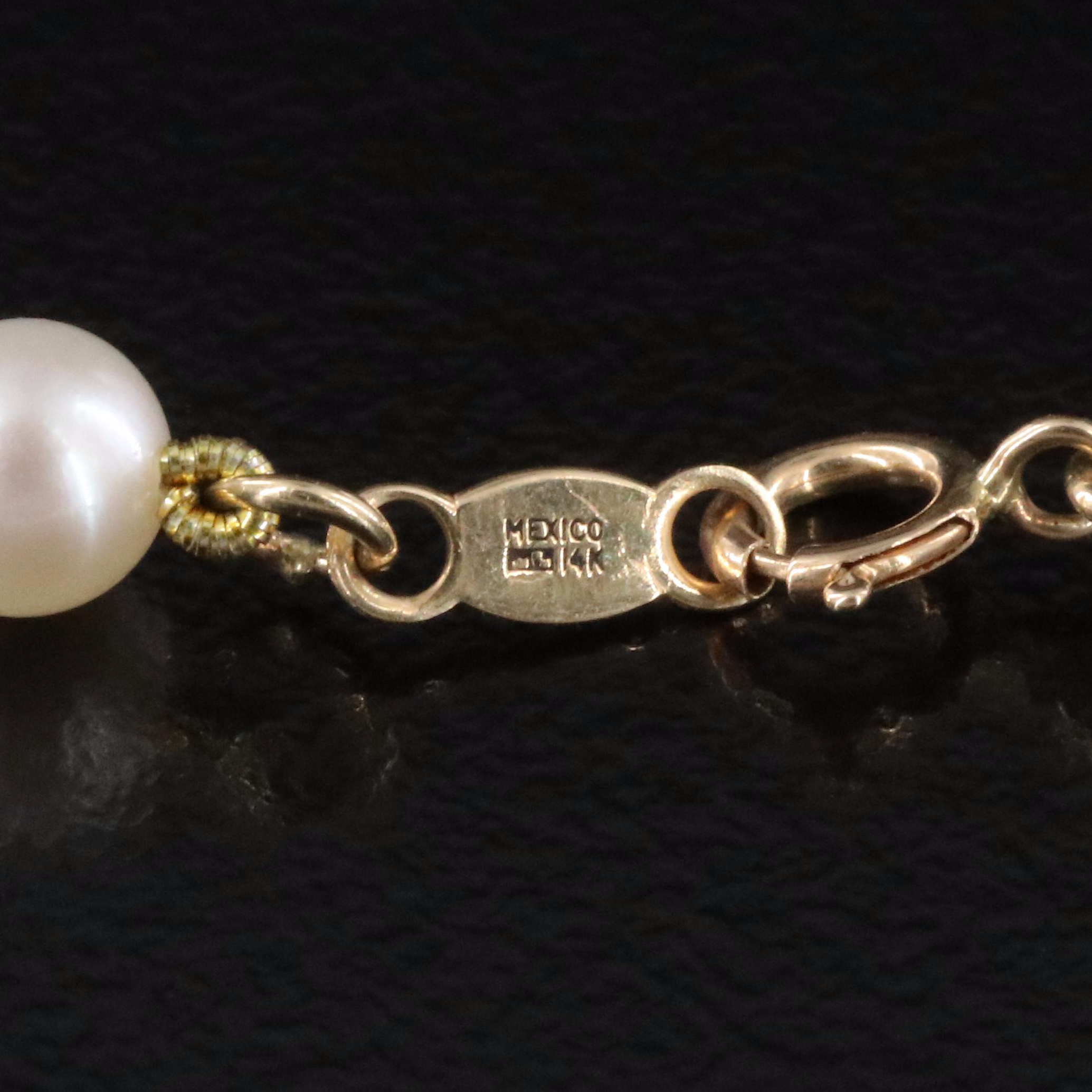 14K Peridot Enhancer Pendant on Pearl Station Chain