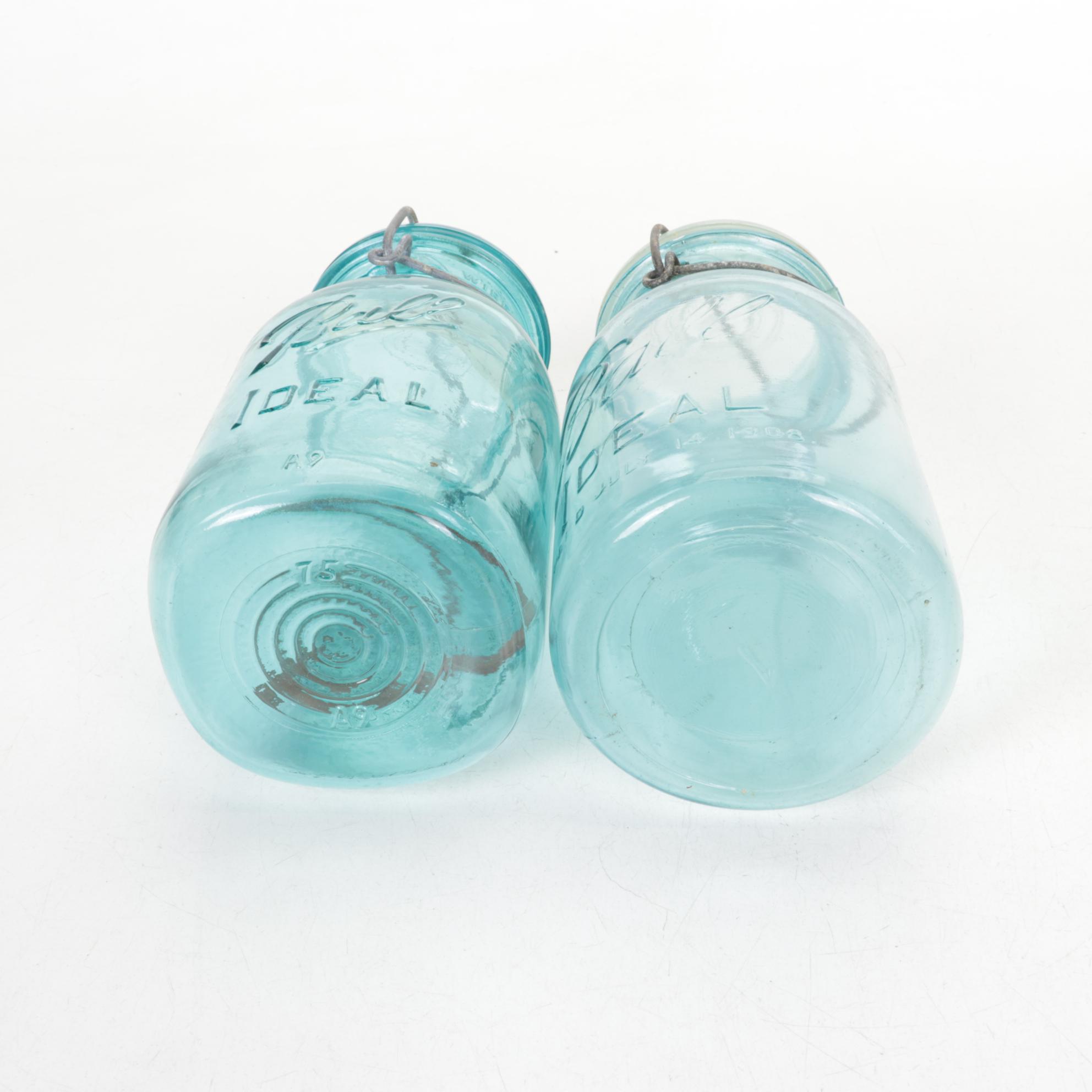 Enameled Canning Pot with Rack and Four Glass-Top Canning Jars