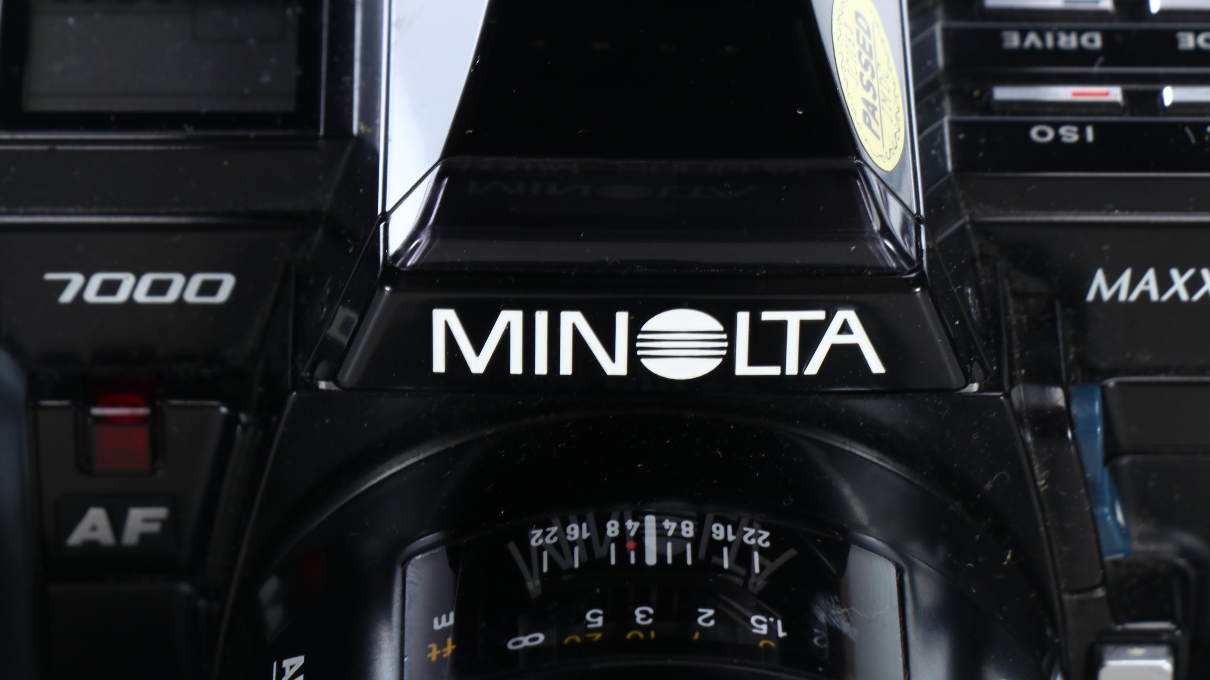 Minolta 7000 Maxxum SLR with Bausch & Lomb Binoculars and More Accessories