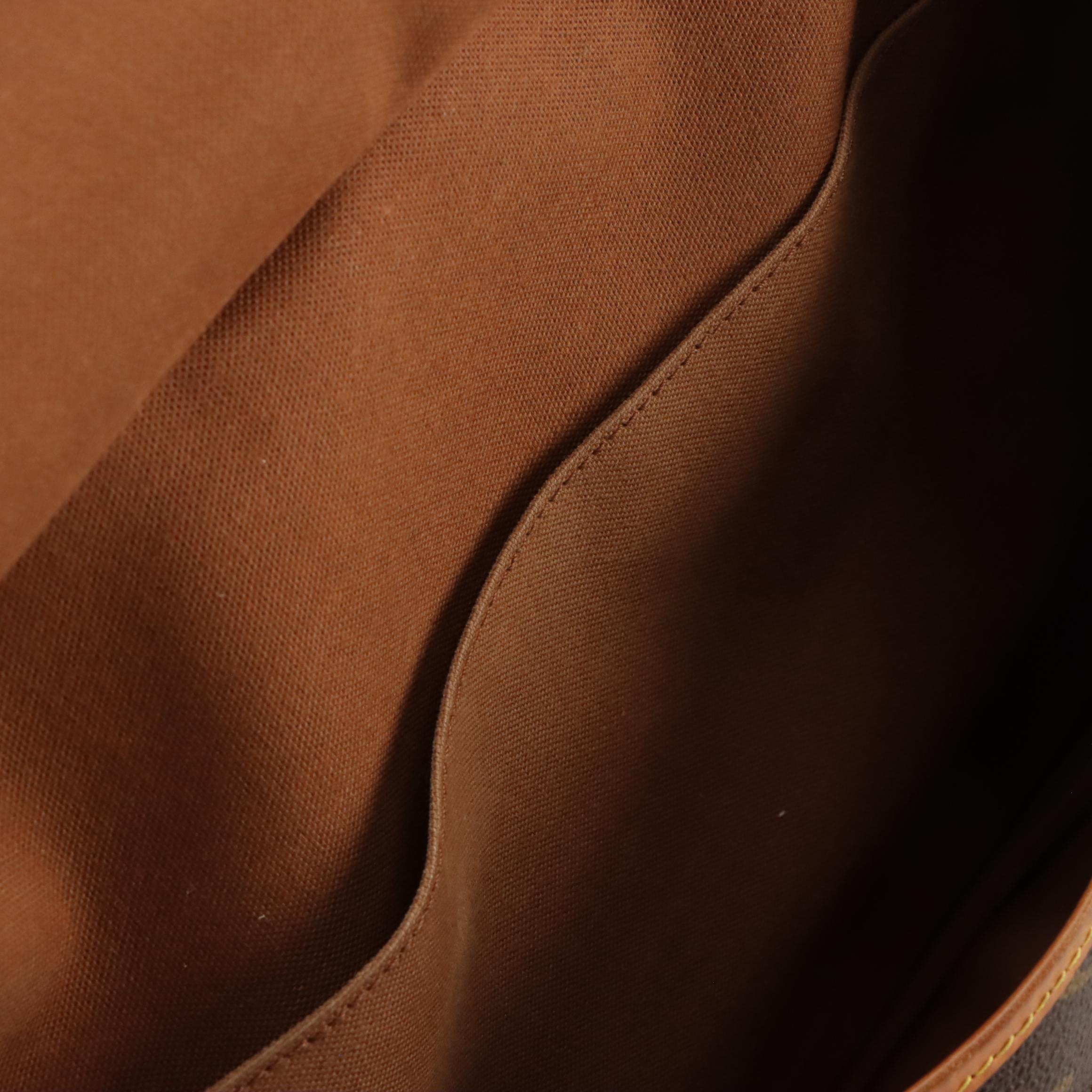 Louis Vuitton Saumur 35 in Monogram Canvas and Vachetta Leather