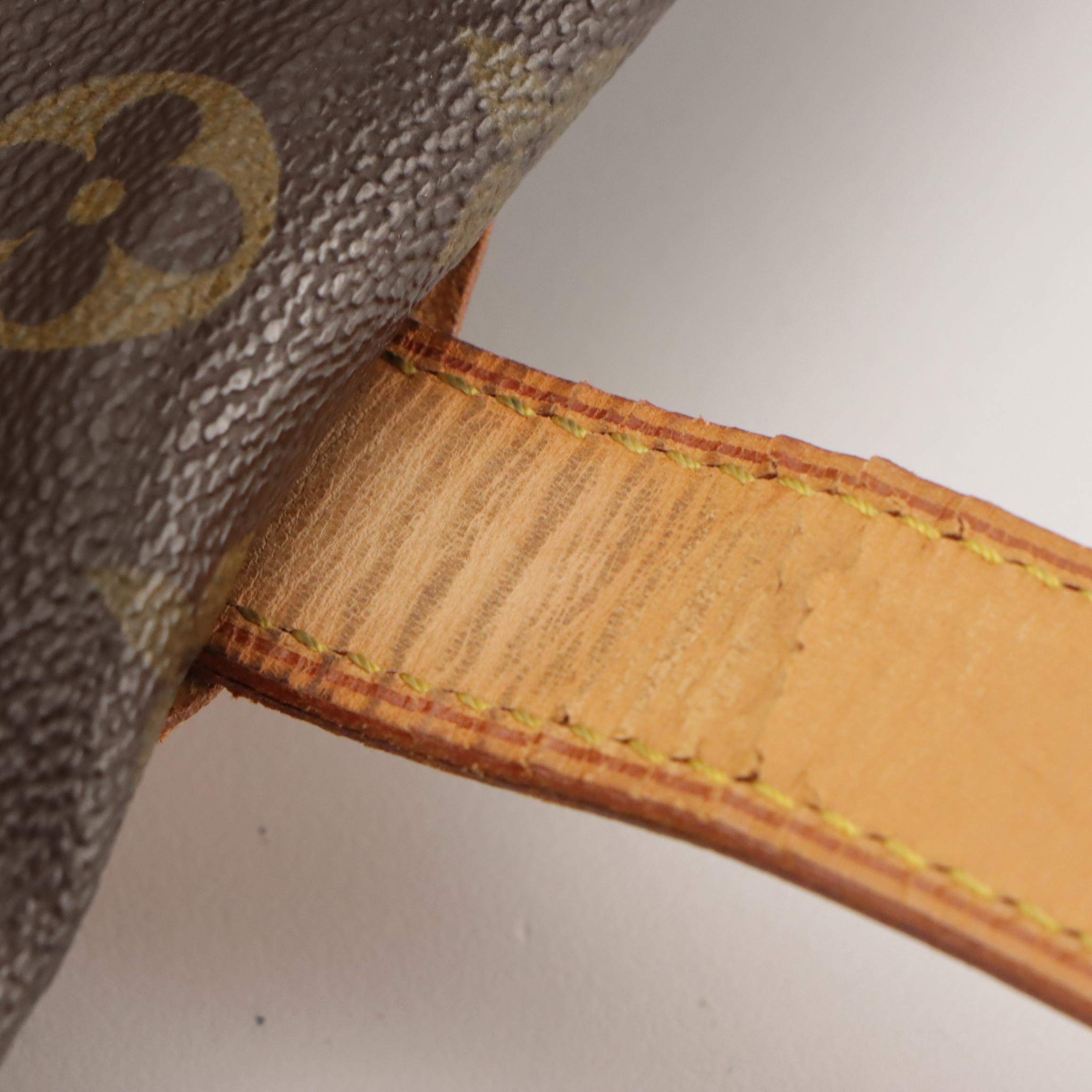 Louis Vuitton Saumur 35 in Monogram Canvas and Vachetta Leather