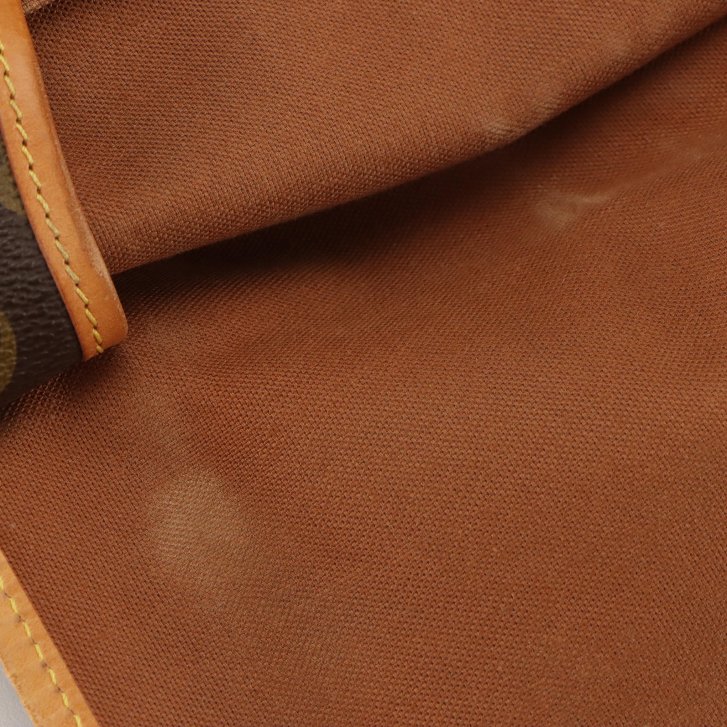 Louis Vuitton Saumur 35 in Monogram Canvas and Vachetta Leather