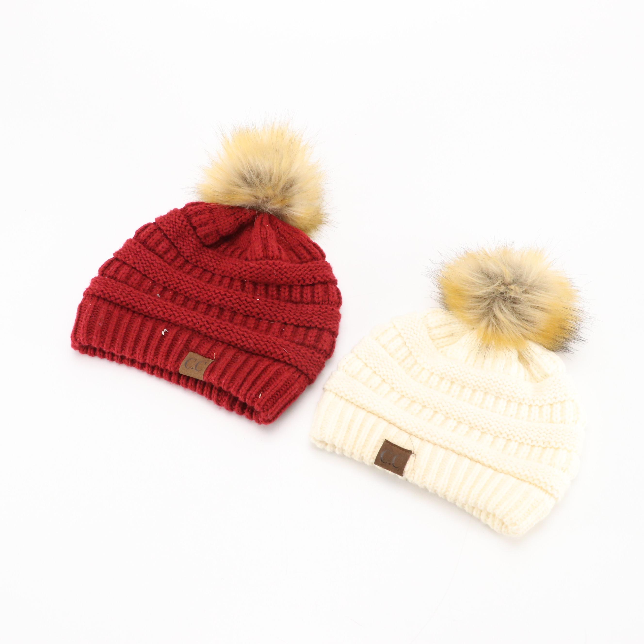 Kangol Black Cord Bucket Hat with Red and White Knit Beanie with Faux-Fur PomPom