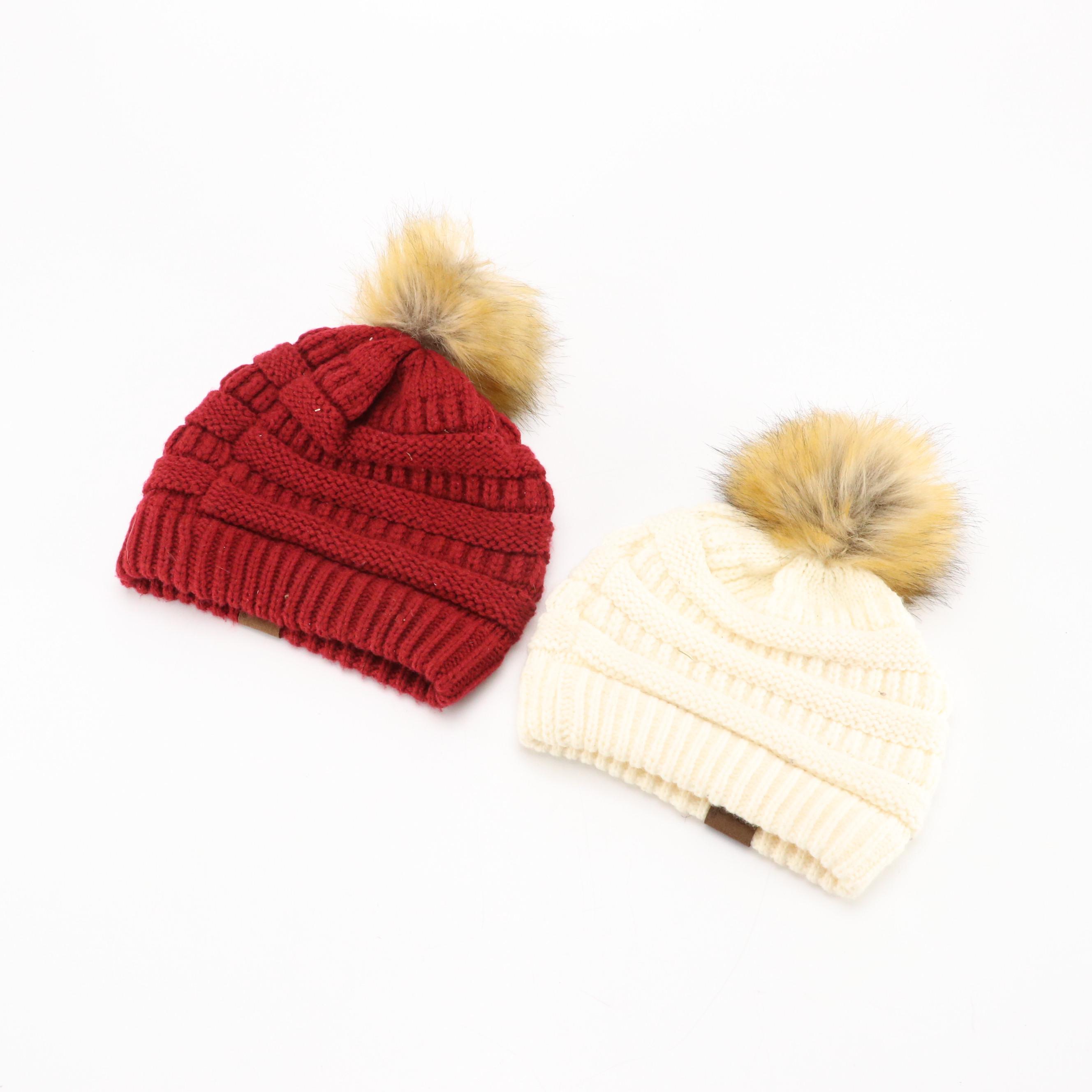 Kangol Black Cord Bucket Hat with Red and White Knit Beanie with Faux-Fur PomPom