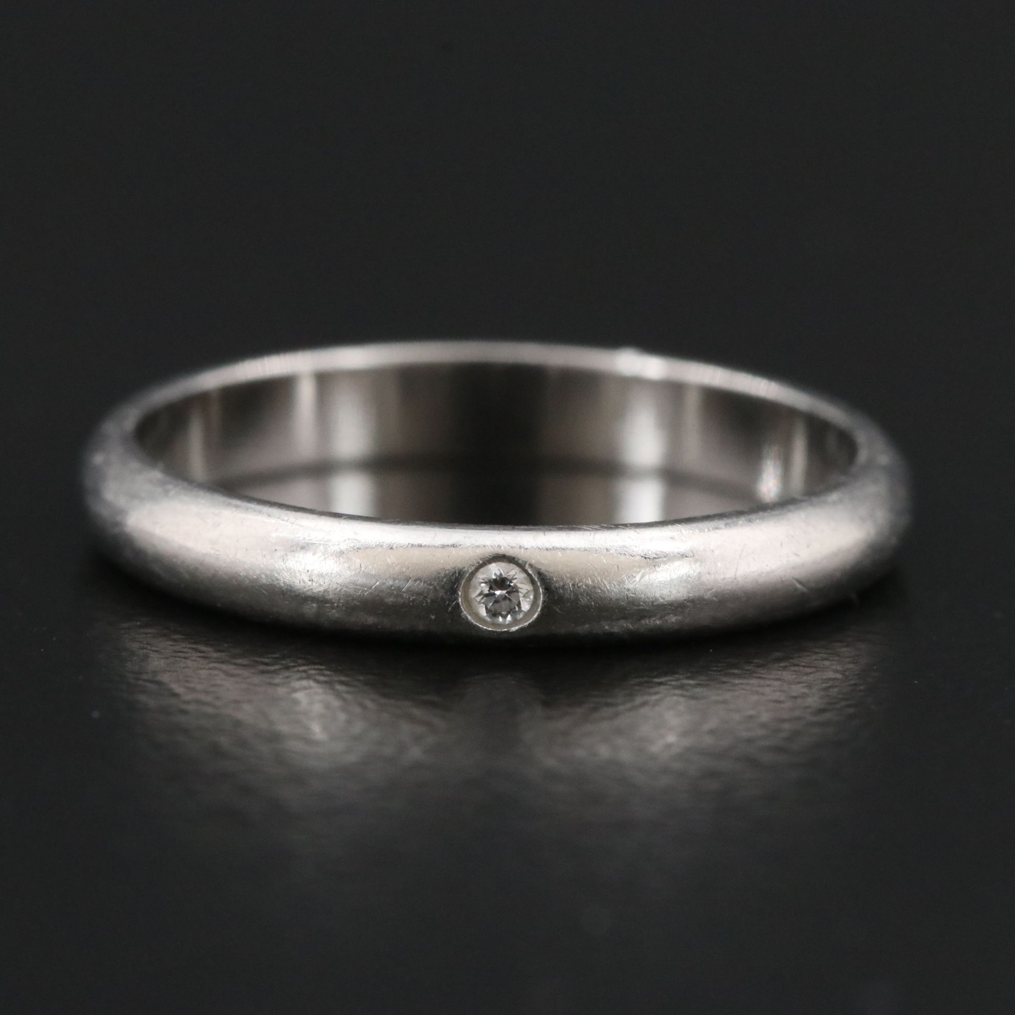 Cartier 1895 Platinum Band with Diamond Accent