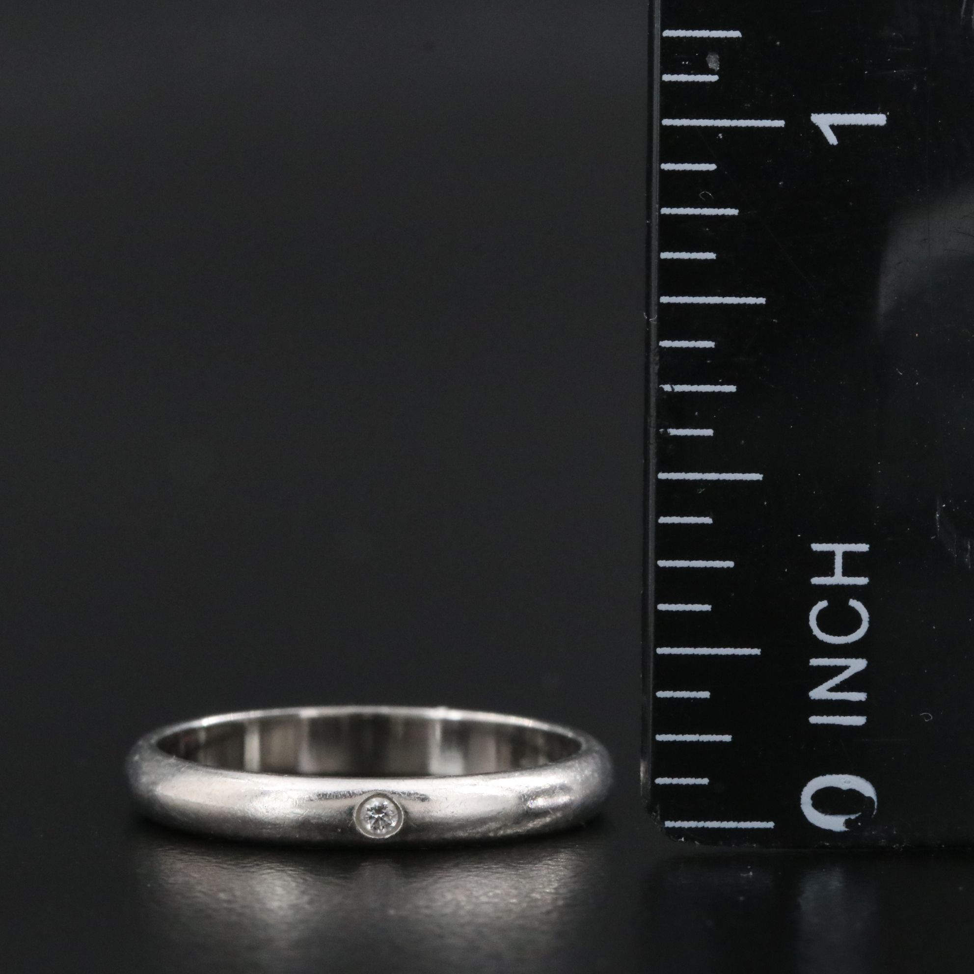 Cartier 1895 Platinum Band with Diamond Accent