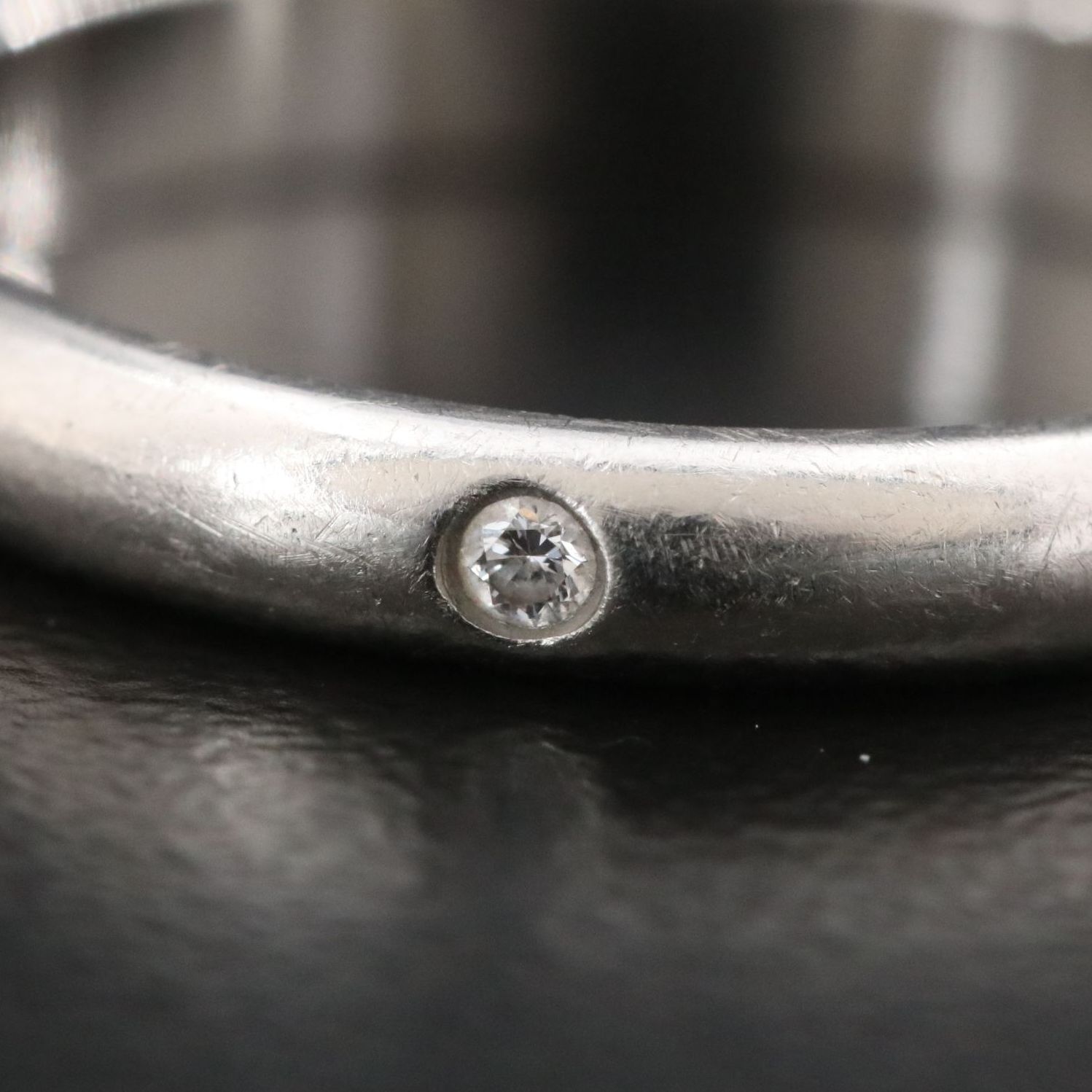 Cartier 1895 Platinum Band with Diamond Accent