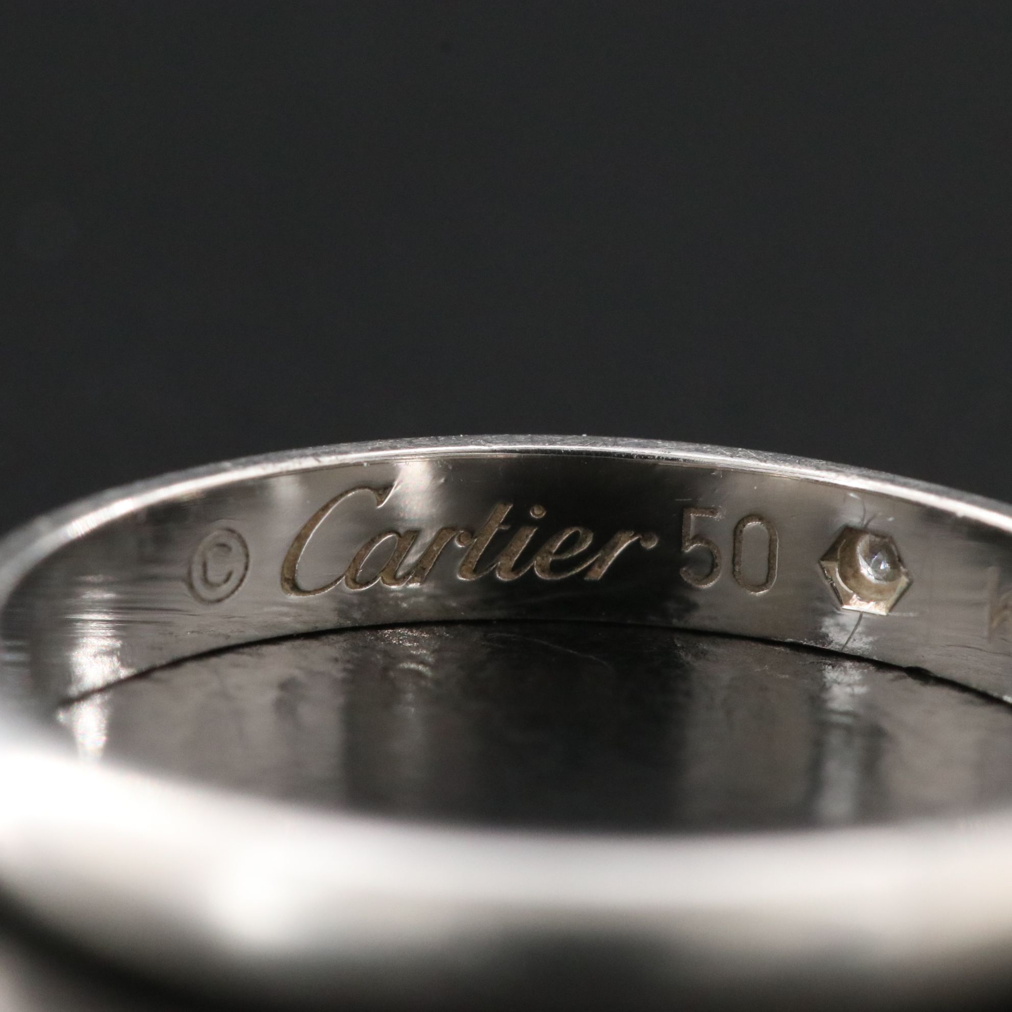 Cartier 1895 Platinum Band with Diamond Accent