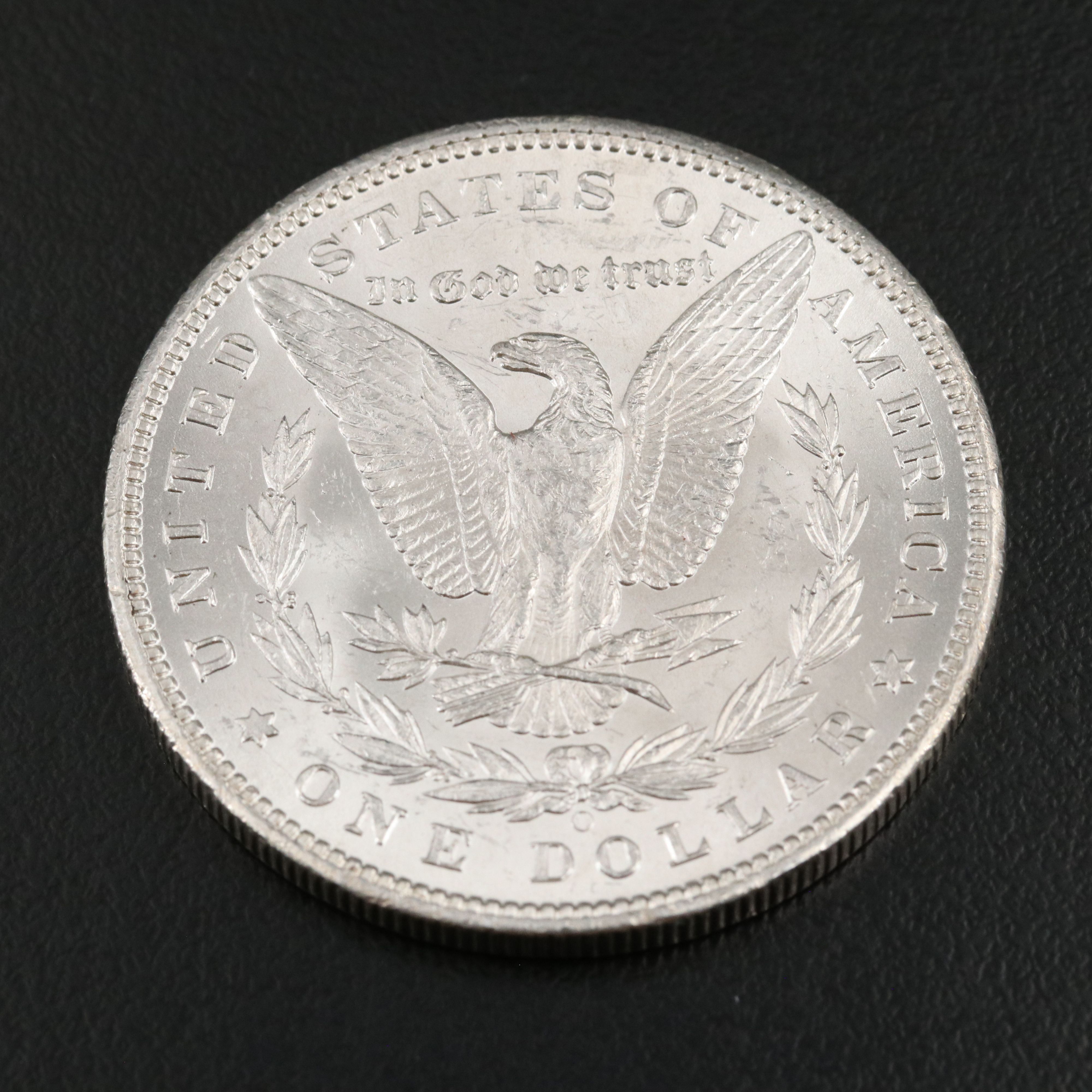 Two Morgan Silver Dollars an 1898-O and a 1904-O