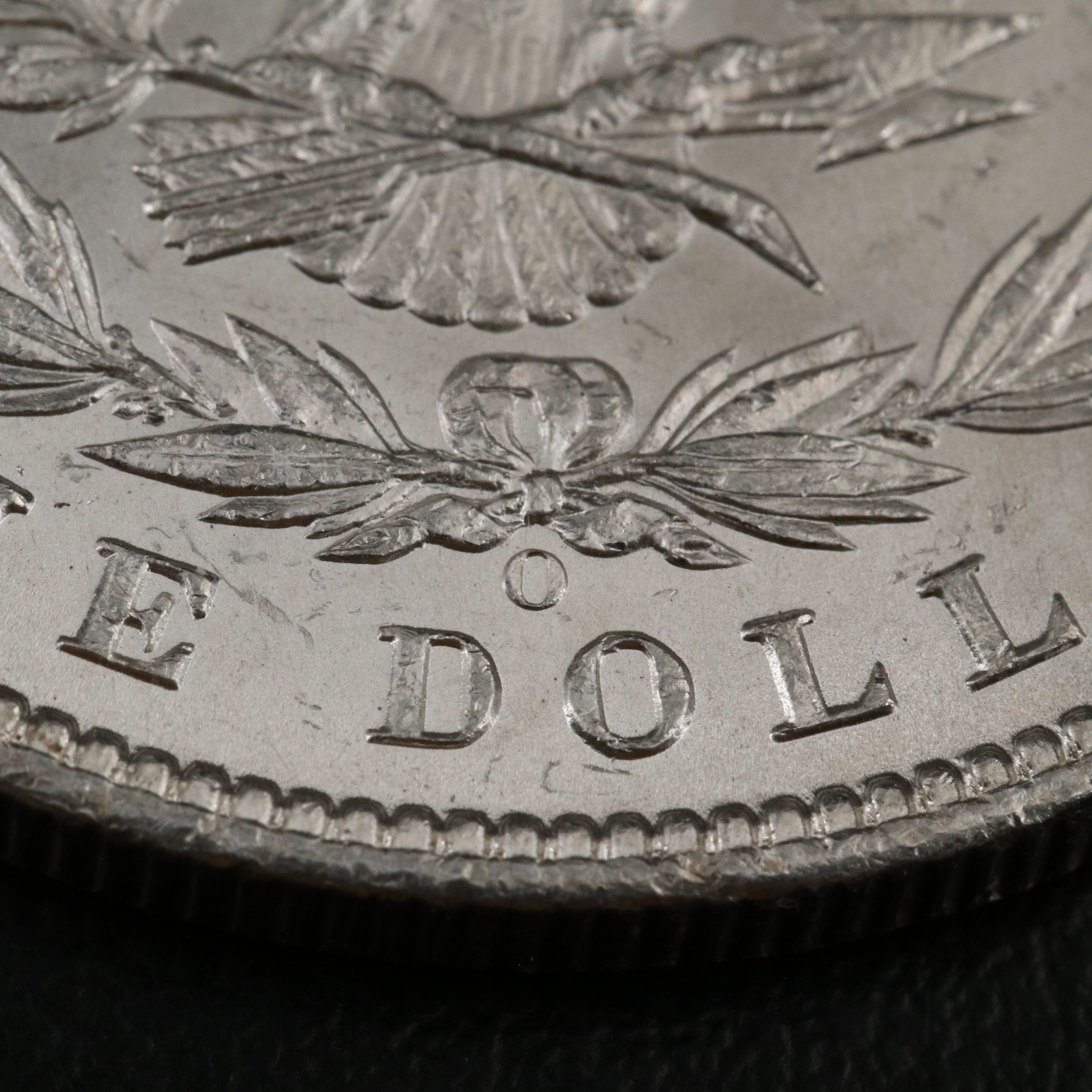 Two Morgan Silver Dollars an 1898-O and a 1904-O