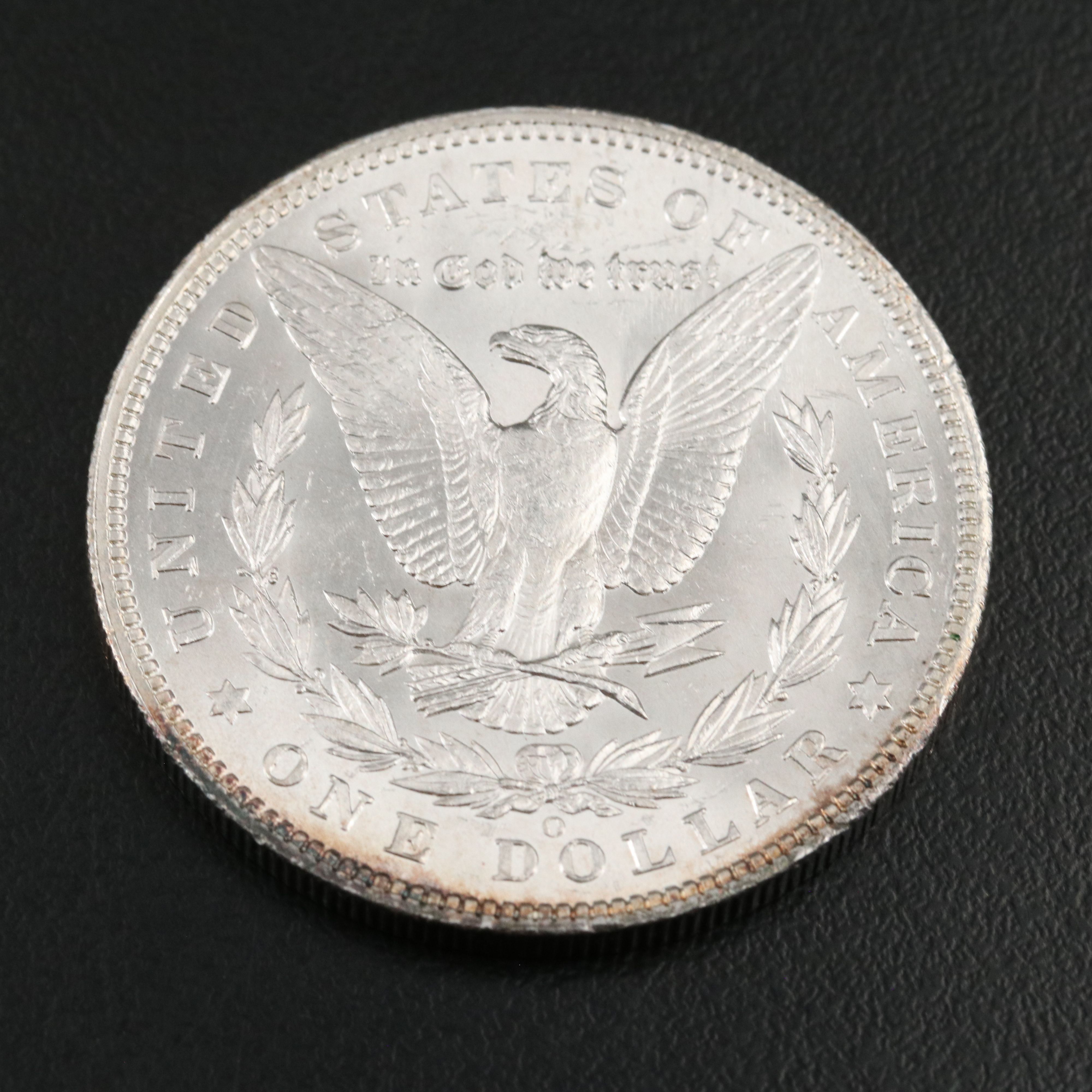 Two Morgan Silver Dollars an 1898-O and a 1904-O