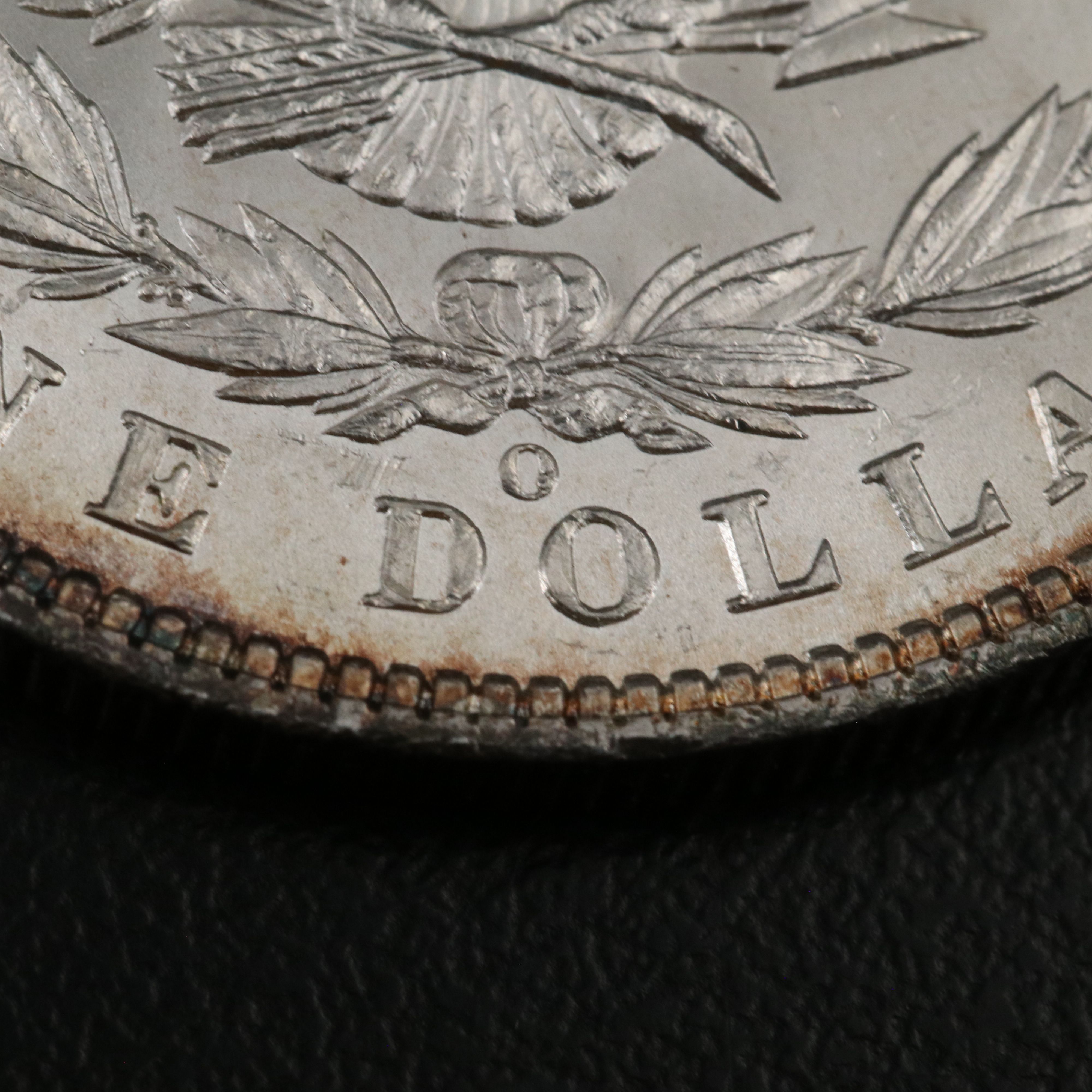 Two Morgan Silver Dollars an 1898-O and a 1904-O